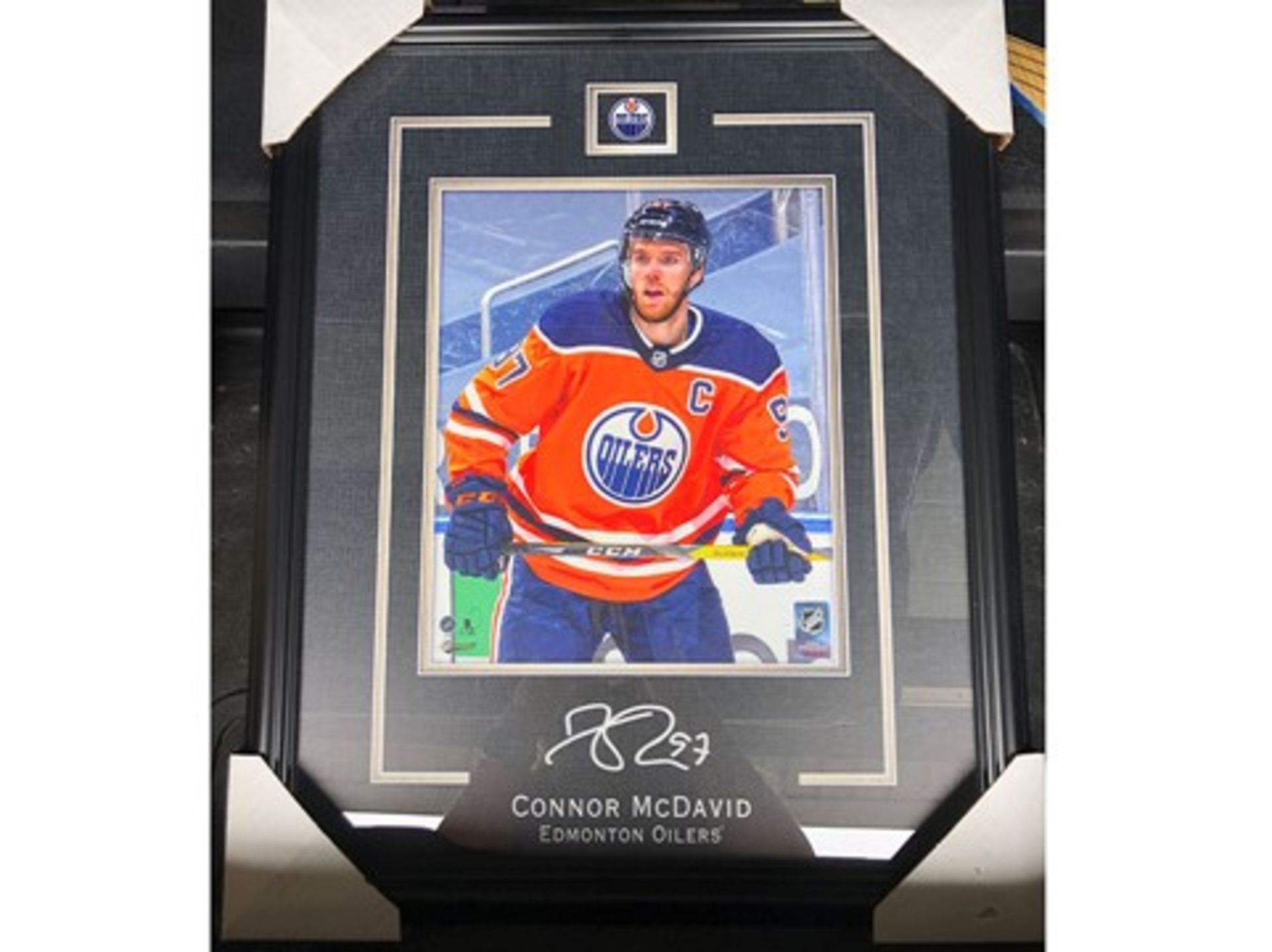 Connor McDavid framed action shot w/ replica signature - Retail Value: $200 - Donated By: