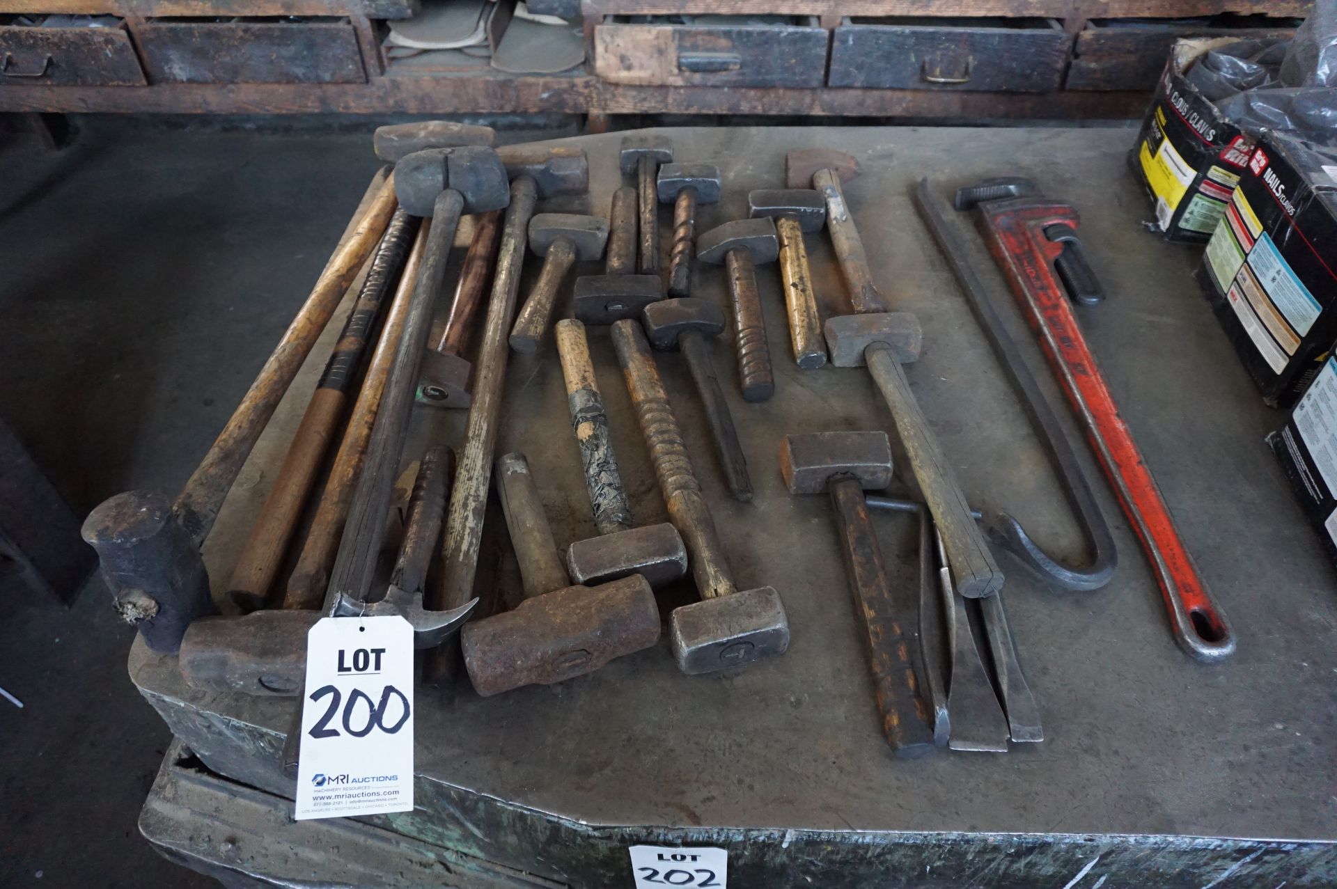 LOT TO INCLUDE: MISC. SLEDGEHAMMERS, METAL WORKING MALLETS AND HAMMERS, CROWBAR, AND RIDGID PIPE