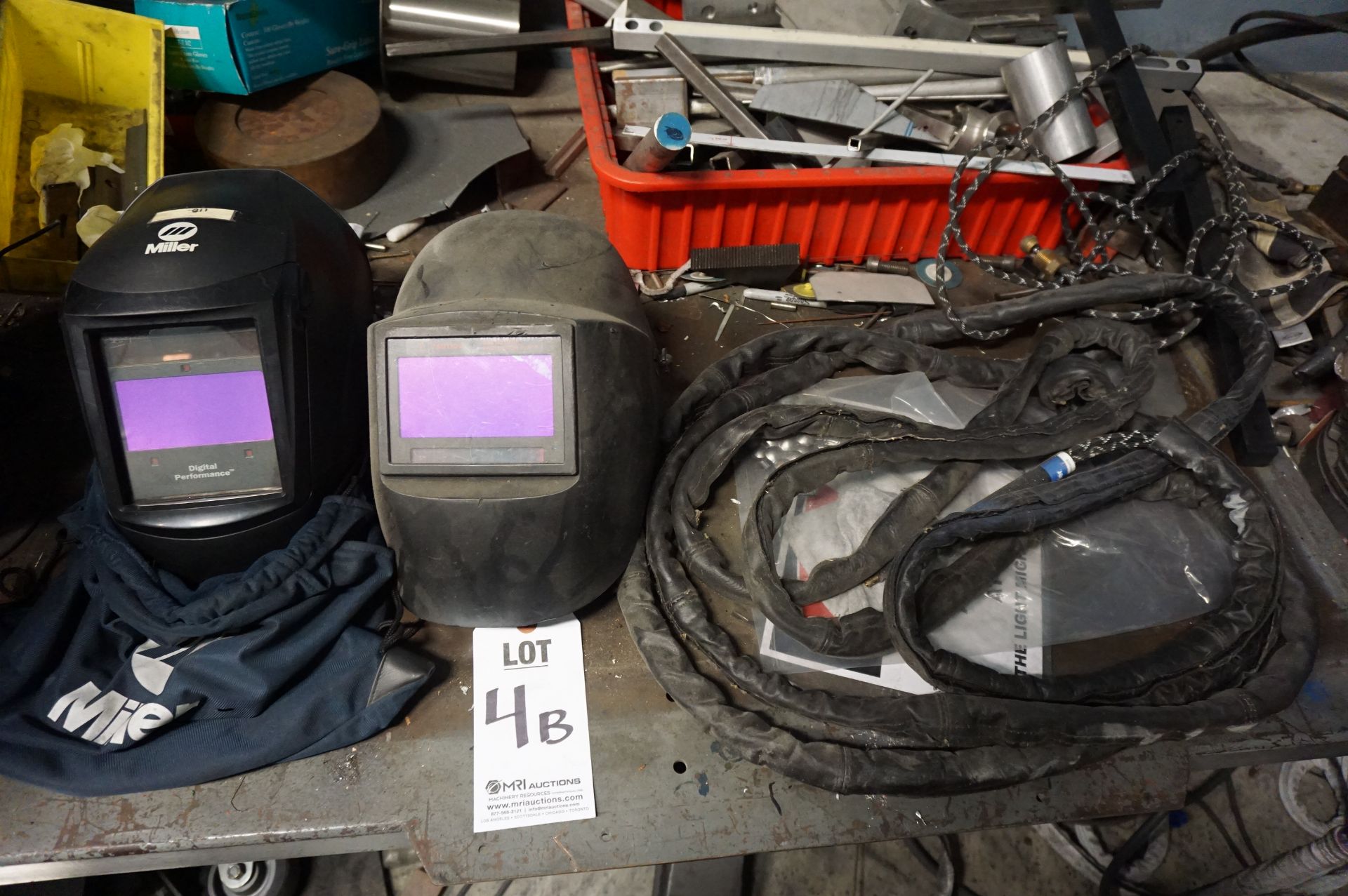 WELDING SUPPORT LOT TO INCLUDE: ASSORTED TIG BARS AND MEDIA, (1) MILLER AUTO DIM WELDING MASK, (1)