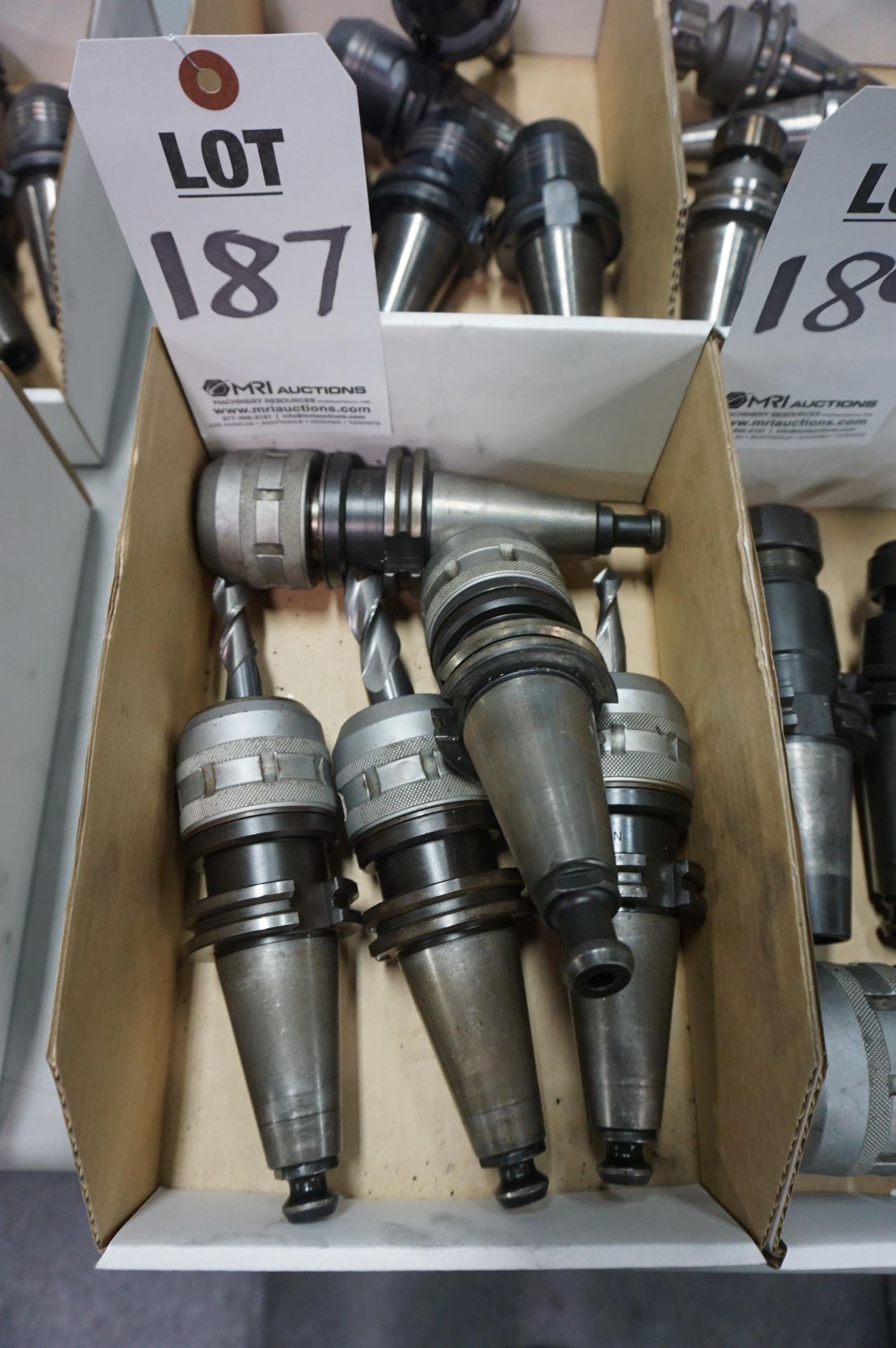 (5) MISC. CAT 40 TOOL HOLDERS, NIKKEN, HAAS AND FADAL PULL STUDS