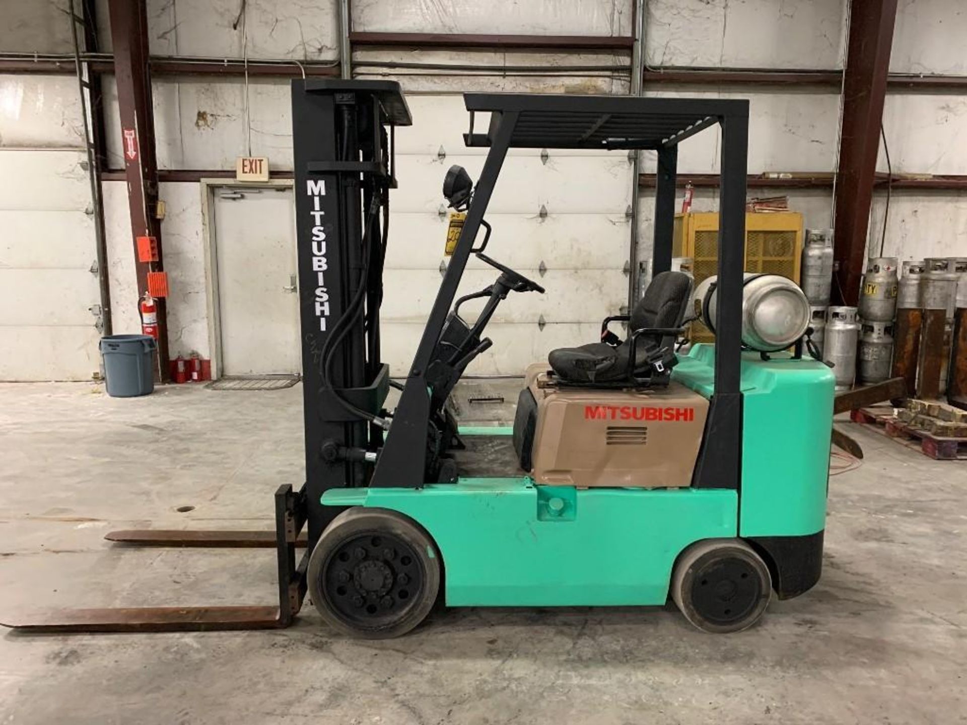 MITSUBISHI 5,000-LB. CAPACITY FORKLIFT, MODEL: FGC25, S/N: AF82B-01384, LPG, SOLID TIRES, LEVER SHIF