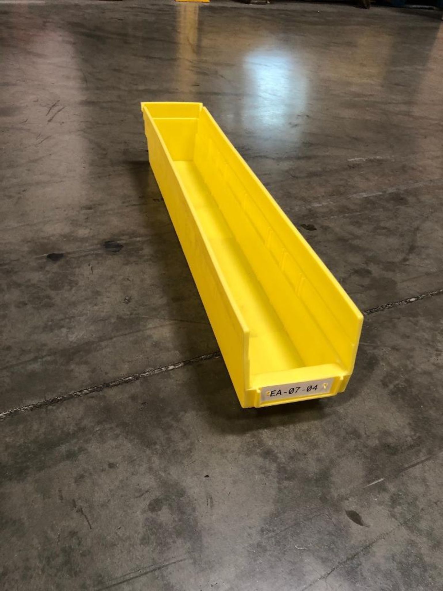 (1,484X) NESTABLE BINS, 23'' L X 4'' W X 4'' H, COLOR: YELLOW, USED, LOCATION: 1850 W. VINEYARD AVE.