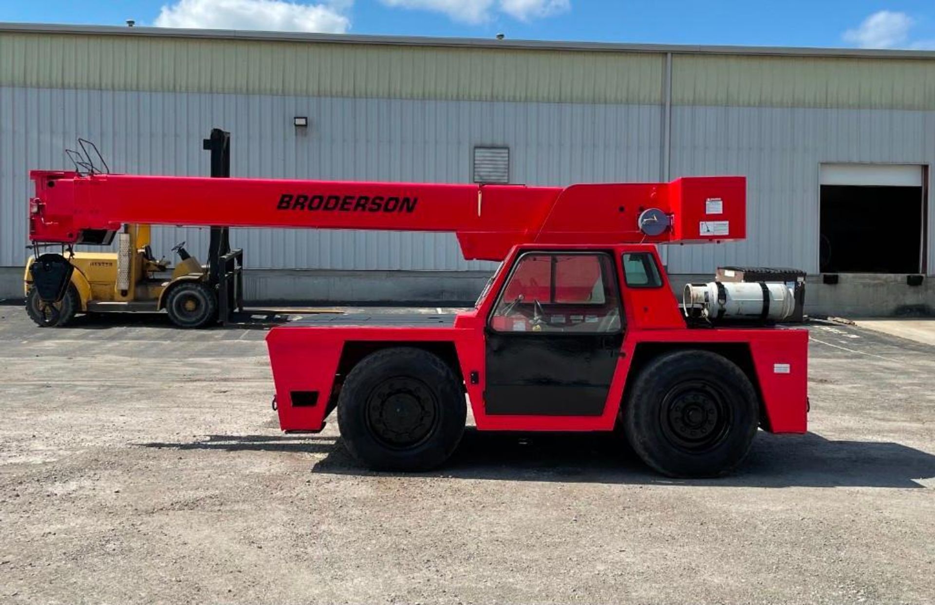 BRODERSON 15-TON CARRY DECK CRANE, MODEL IC-200-2B, S/N 69282, LPG, PNEUMATIC TIRES, W/ CAB, 4-WHEEL