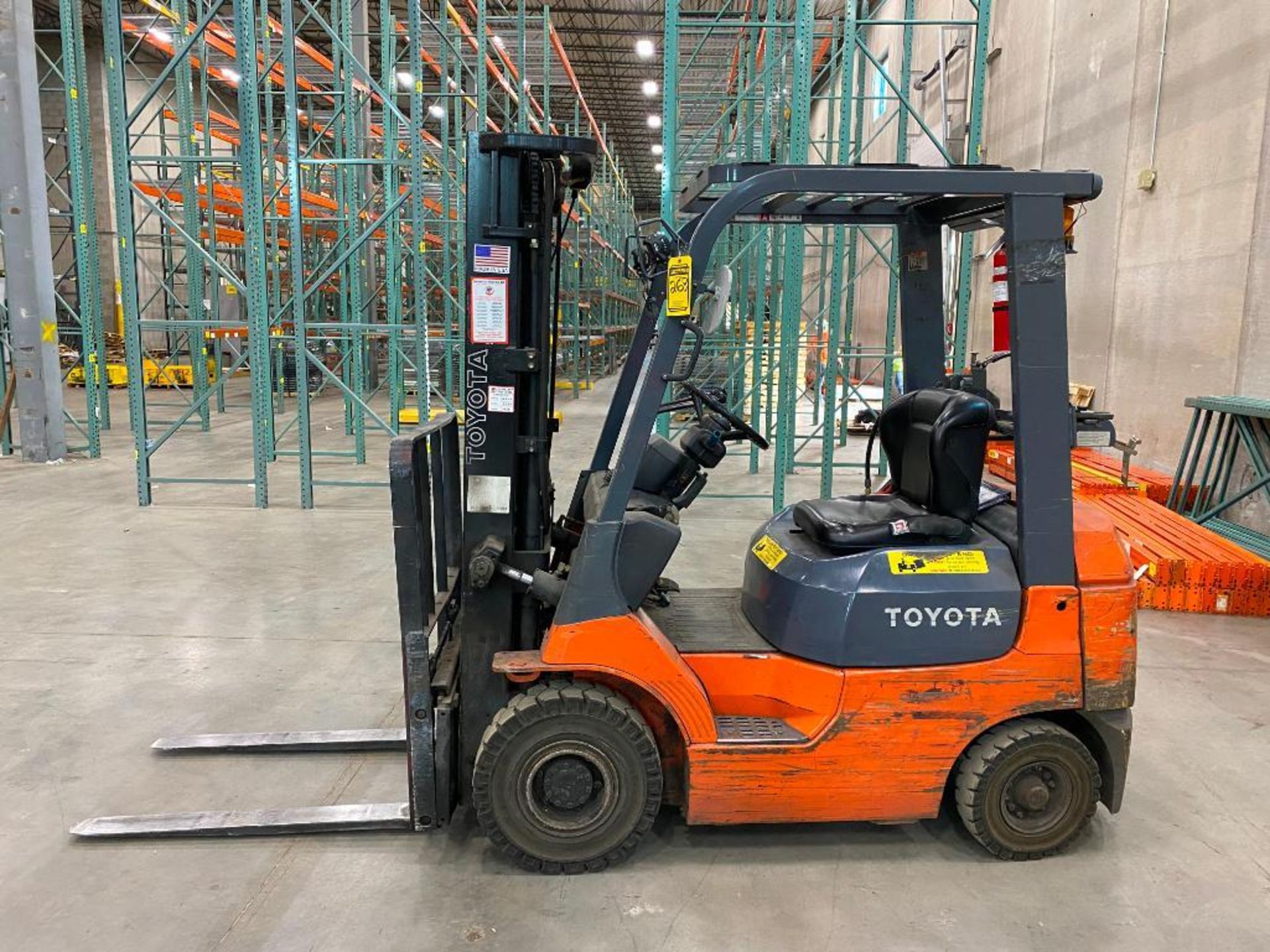 TOYOTA 3,500 LB. FORKLIFT, MODEL 7FGV18, S/N 60054, SOLID TREAD TIRES, LP GAS, 3-STAGE MAST, 189'' L