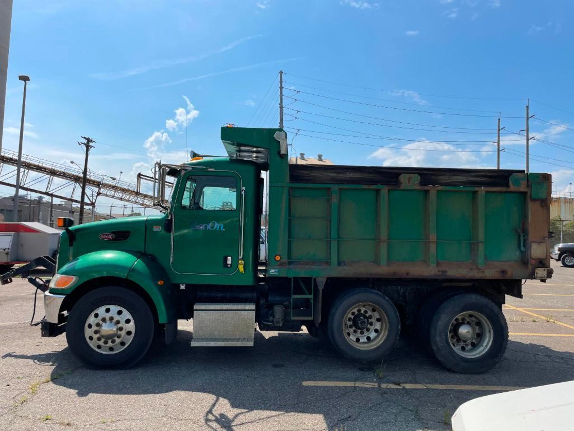 2005 PETERBILT T/A DUMP TRUCK, MODEL 335, VIN 2NPLHD7XX5M865948, 84,355 MILES, CATERPILLAR C7 ENGINE