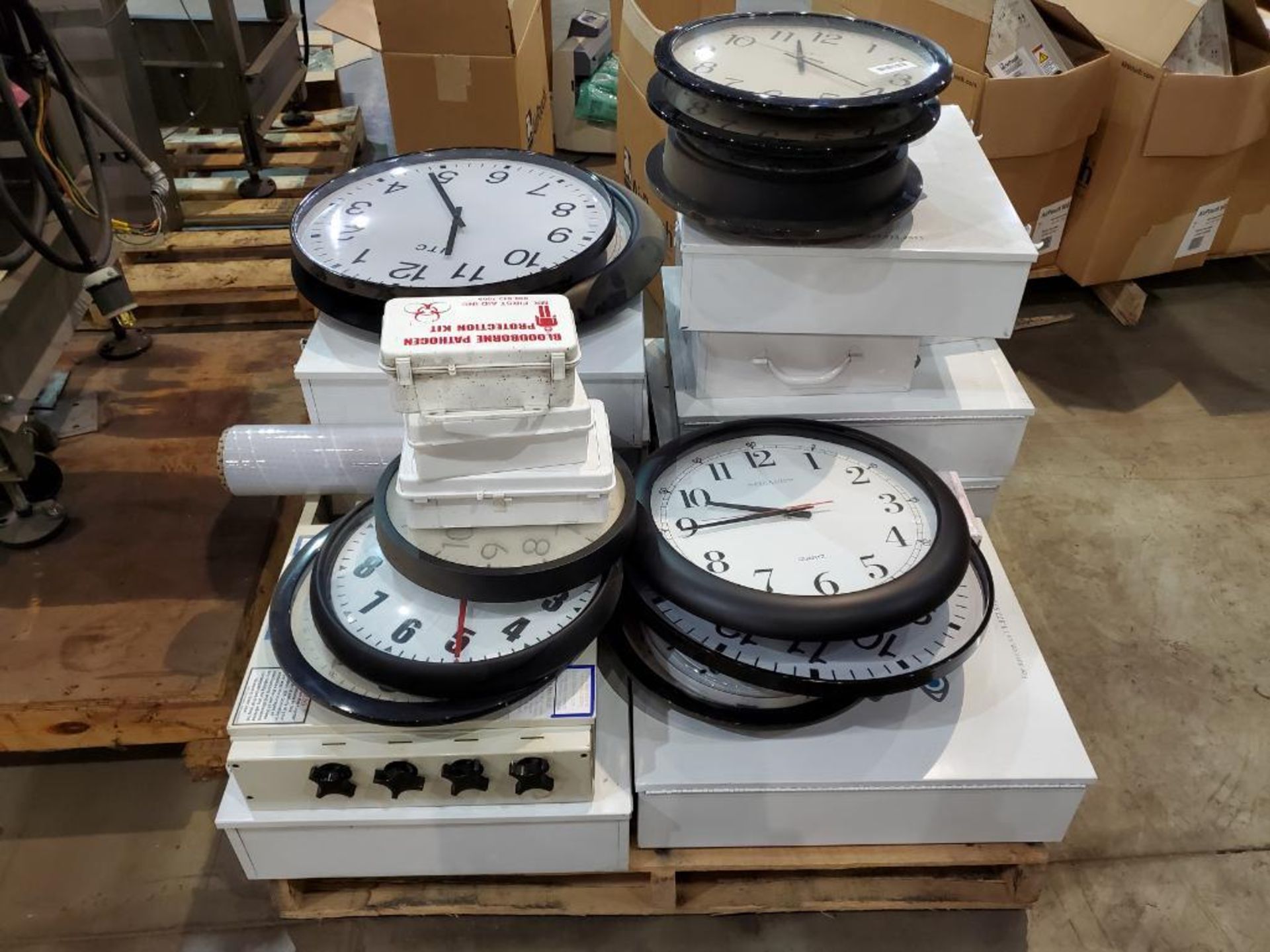 PALLET OF CLOCKS & FIRST AID KITS