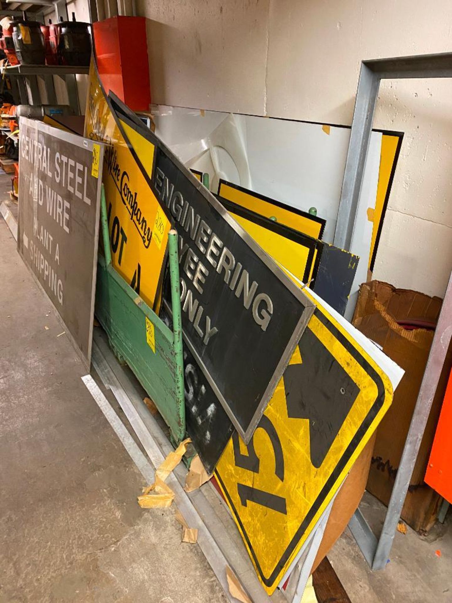 RACK W/ ASSORTED SIGNS