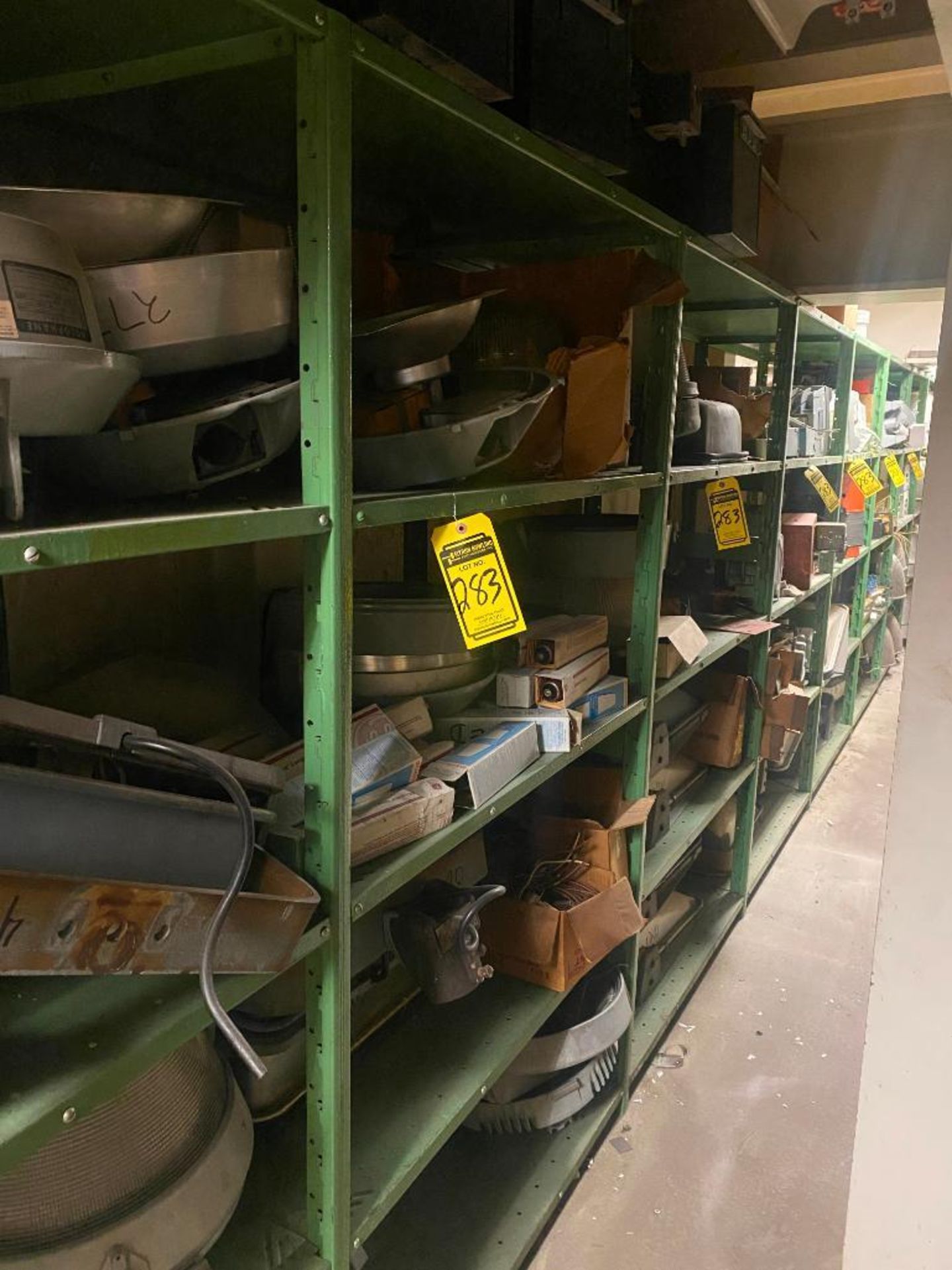 (11) SECTIONS OF SHELVING W/ CONTENT: HOLOPHANE LIGHT FIXTURES BALLASTS, ACME TRANSFORMERS, CRANE LI