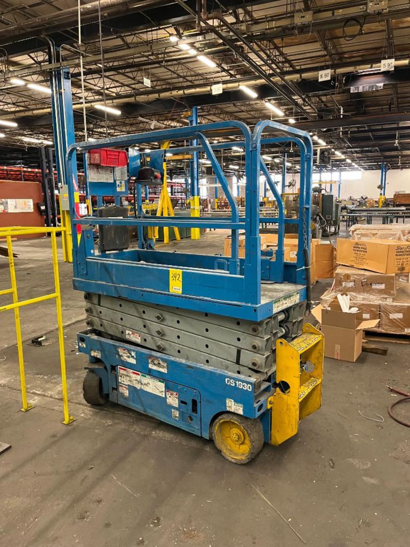 GENIE GS1940 SCISSOR LIFT, 2' X 5' EXTENDABLE BASKET, 24V, HRS. N/A