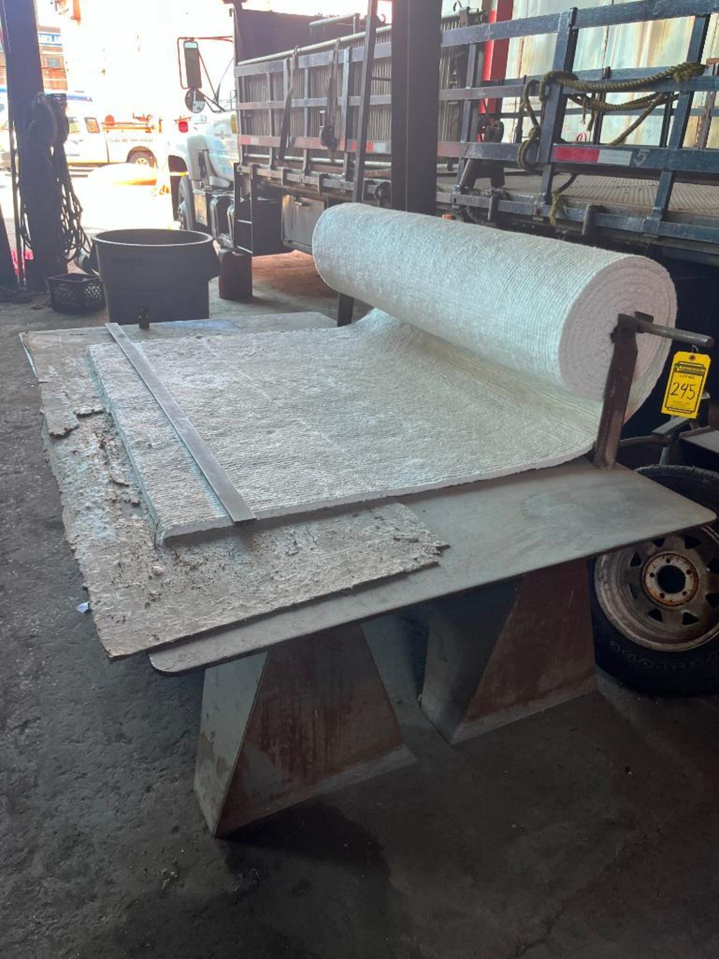 92" x 54" steel table & roll of fiberglass insulation