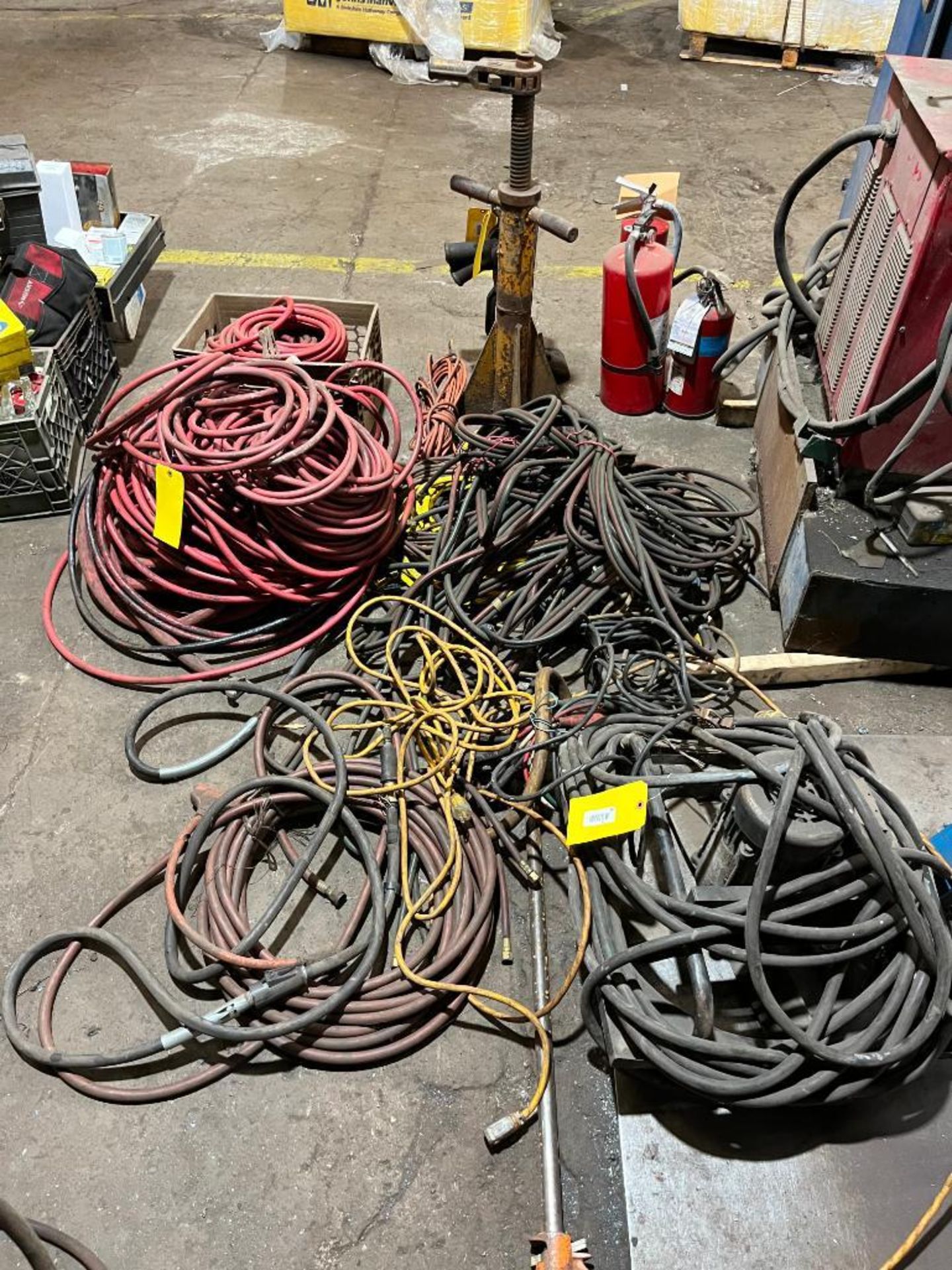 assorted air hose, acetylene hose, & extension cords