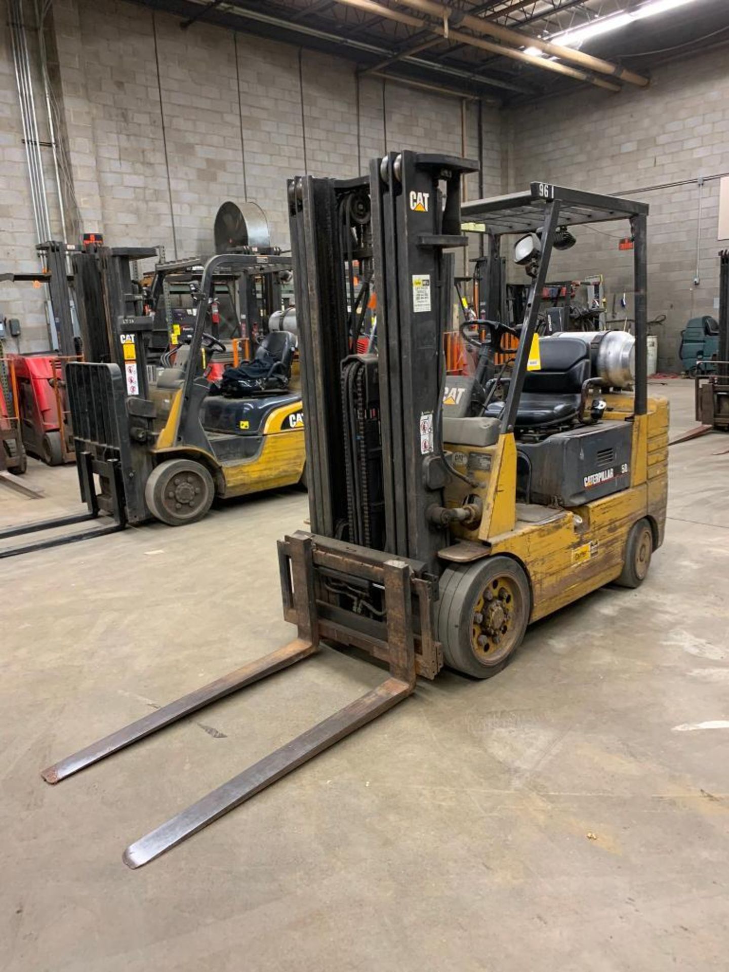 Caterpillar Forklift, LPG, 5,000 lb. Cap., Model GC25, S/N 4EM03447, Solid Tires, 3-Stage Mast, Side