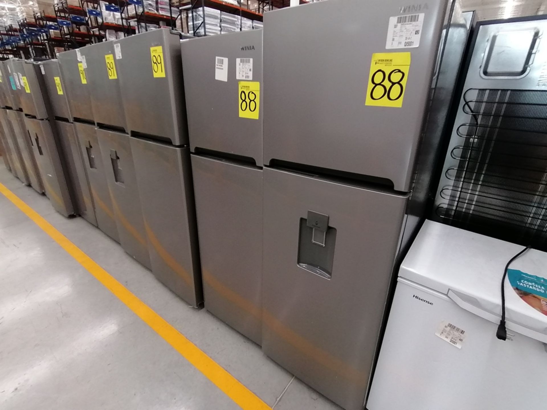 Lote de 2 refrigeradores incluye: 1 Refrigerador, Marca Winia, Modelo DFR25210GN, Serie MR219N11602