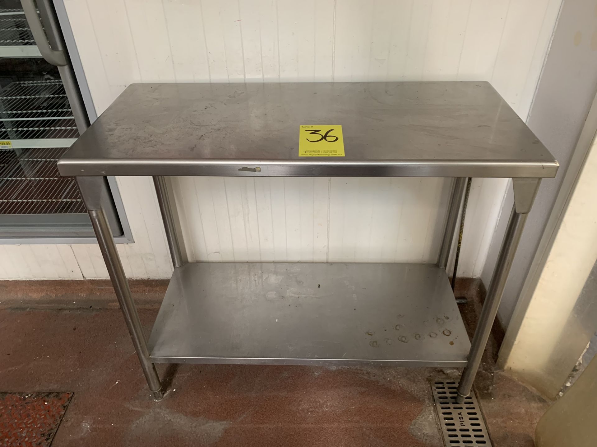1 Stainless steel work table measures 1.10 x 0.50 x 0.90 mts