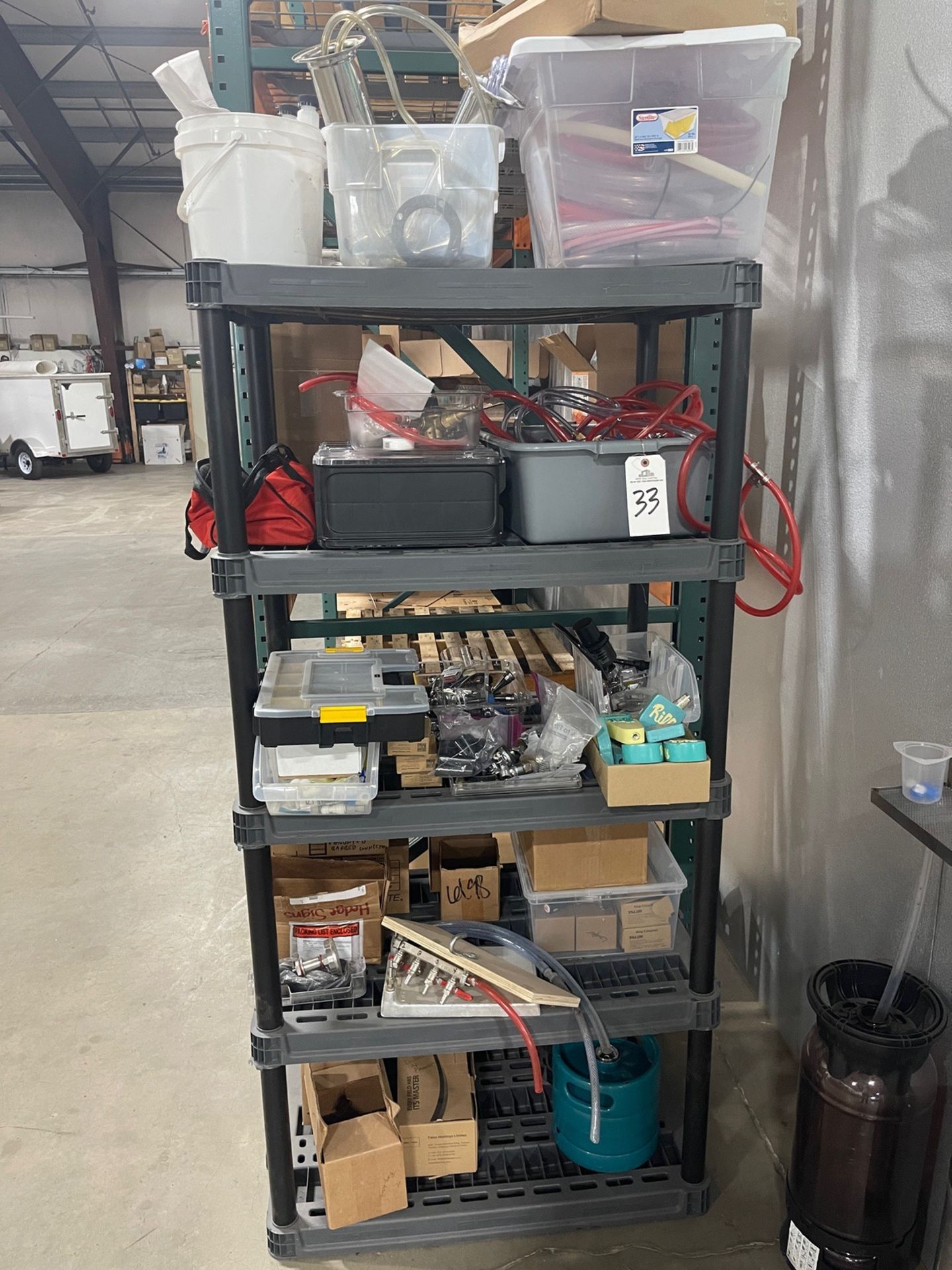 Shelving Unit with Contents, Draft Line Components, Couplers, Etc. | Rig Fee $100