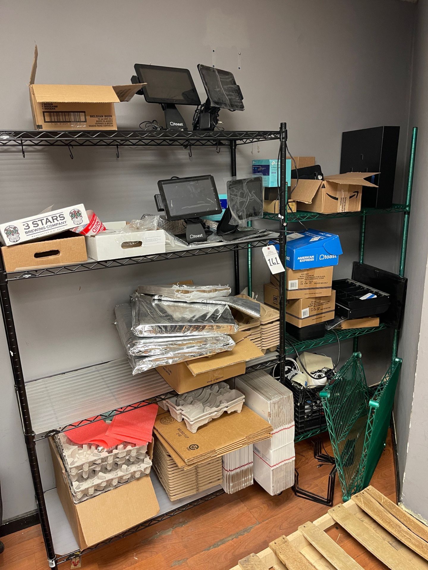 Lot of (2) Wire Shelving Units with Contents Including Toast Handhelds, Terminals, | Rig Fee $25