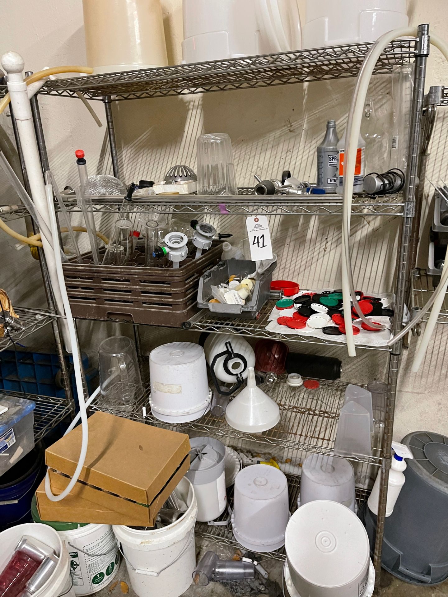 Lot of (2) Wire Shelving Units, (2) Wall Mount Shelves, Pegboard and Contents Inclu | Rig Fee $50