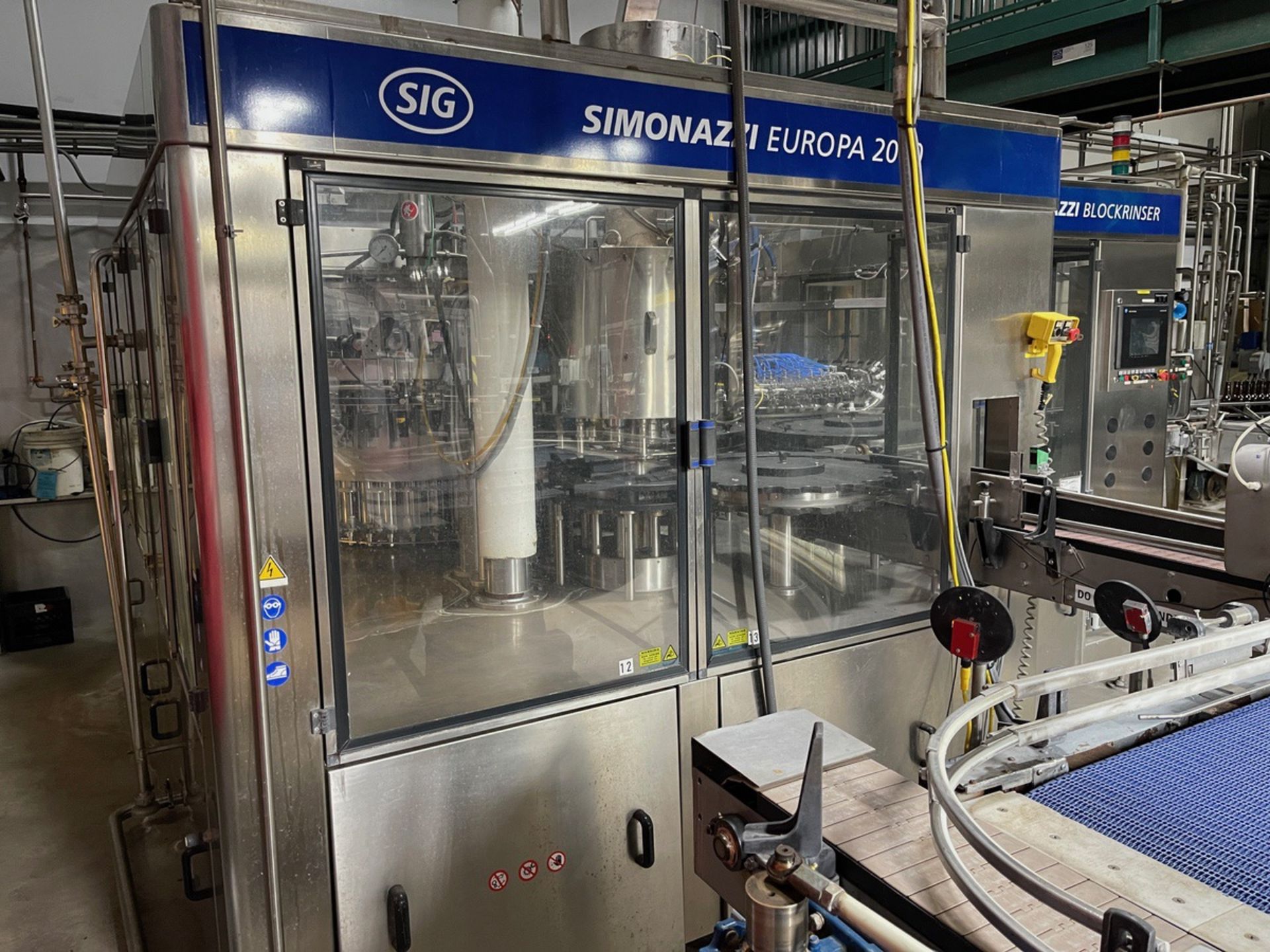Simonazzi Europa 2000 40 Head Filling and Capping Machine with Simonazzi Blockrins | Rig Fee $4700 - Image 13 of 15