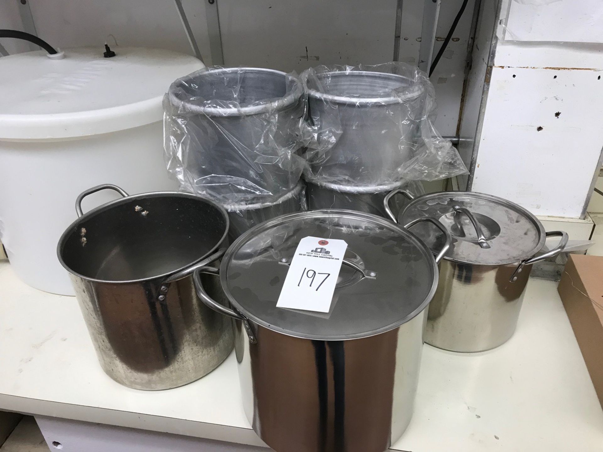 (3) Stainless Steel Pots and (4) Aluminum Pots | Rig Fee $50