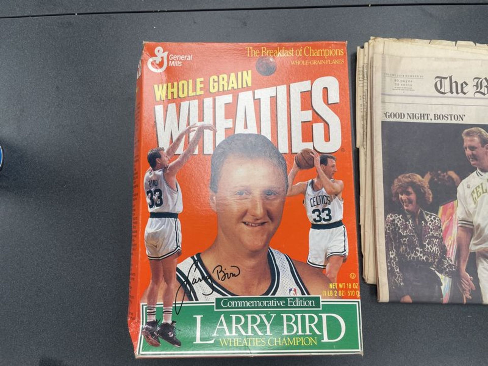 (Lot) Larry Bird c/o: Wheaties Box tape on box , Boston Connection Pennant, International Herald - Image 6 of 7