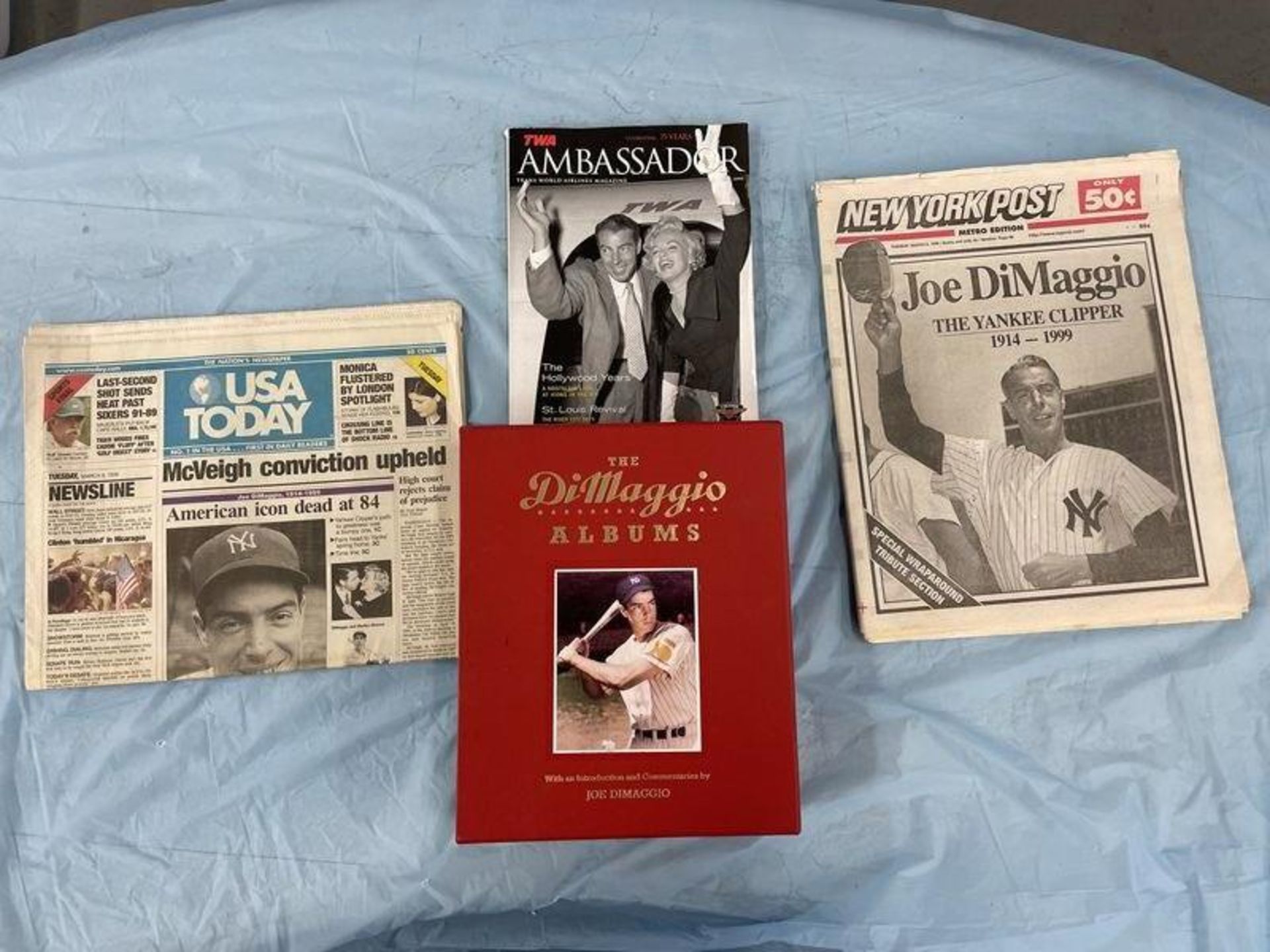 (Lot) Joe DiMaggio package c/o: never opened 2 volume album in case, (2) newspapers