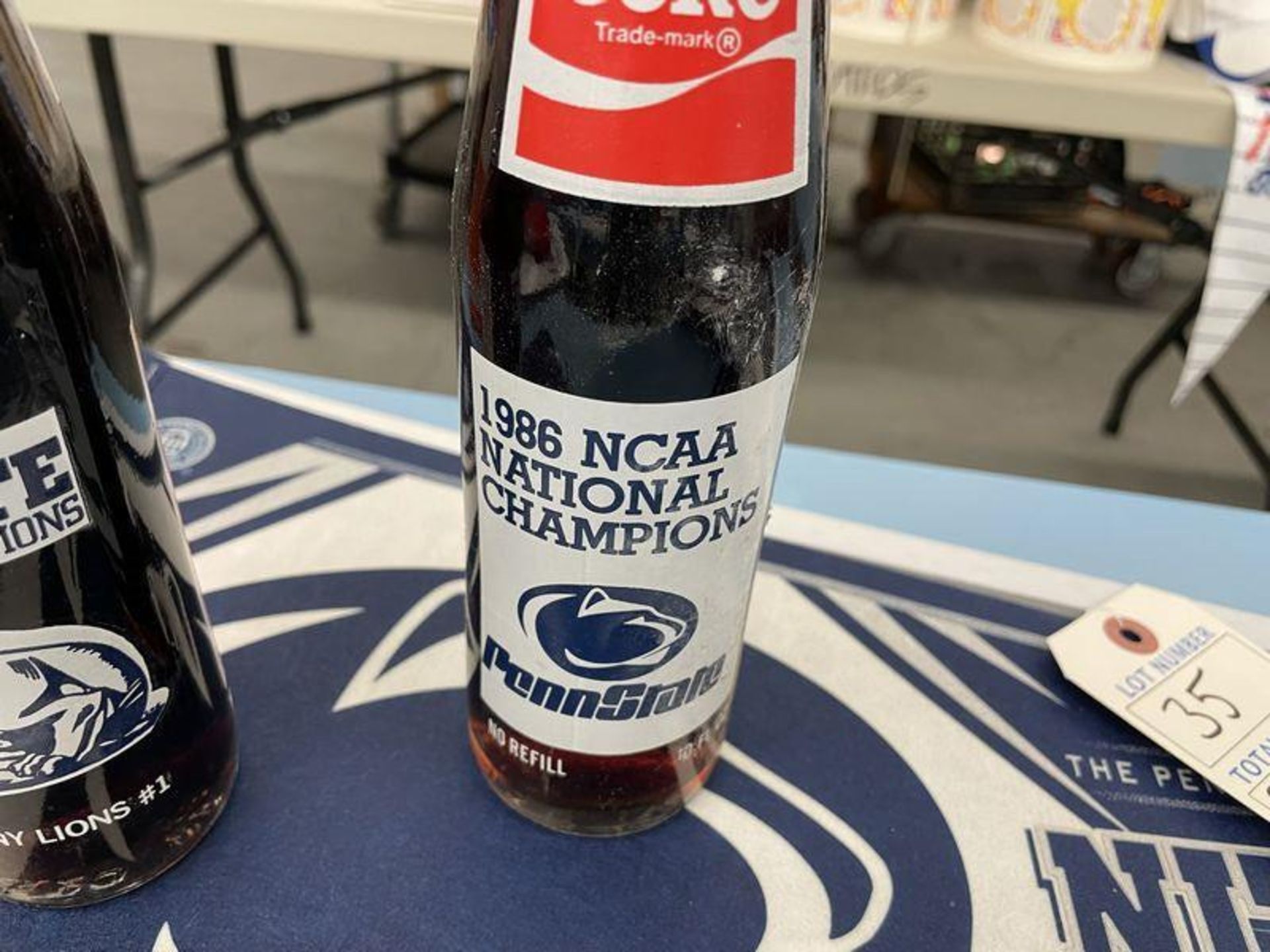 (Lot) Penn State c/o: (2) 1982 & 1986 NCAA National Champions Commemorative coke bottles w/ Joe - Image 2 of 4