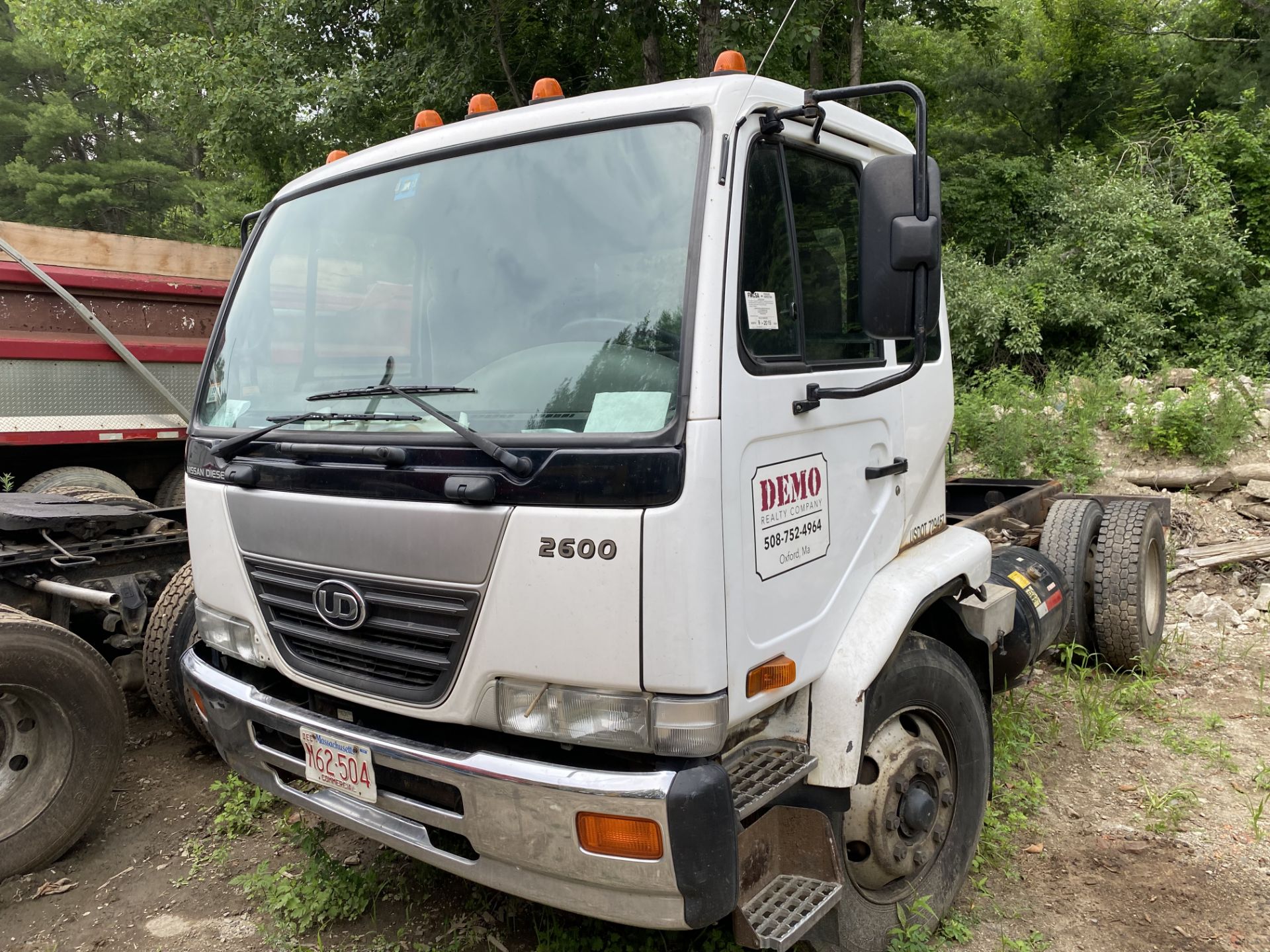 2007 Nissan UD2600, 6 Wheel Cab n Chassis w/12' Flat Bed, Diesel, Auto Trans, GVWR: 26,000, Odom: