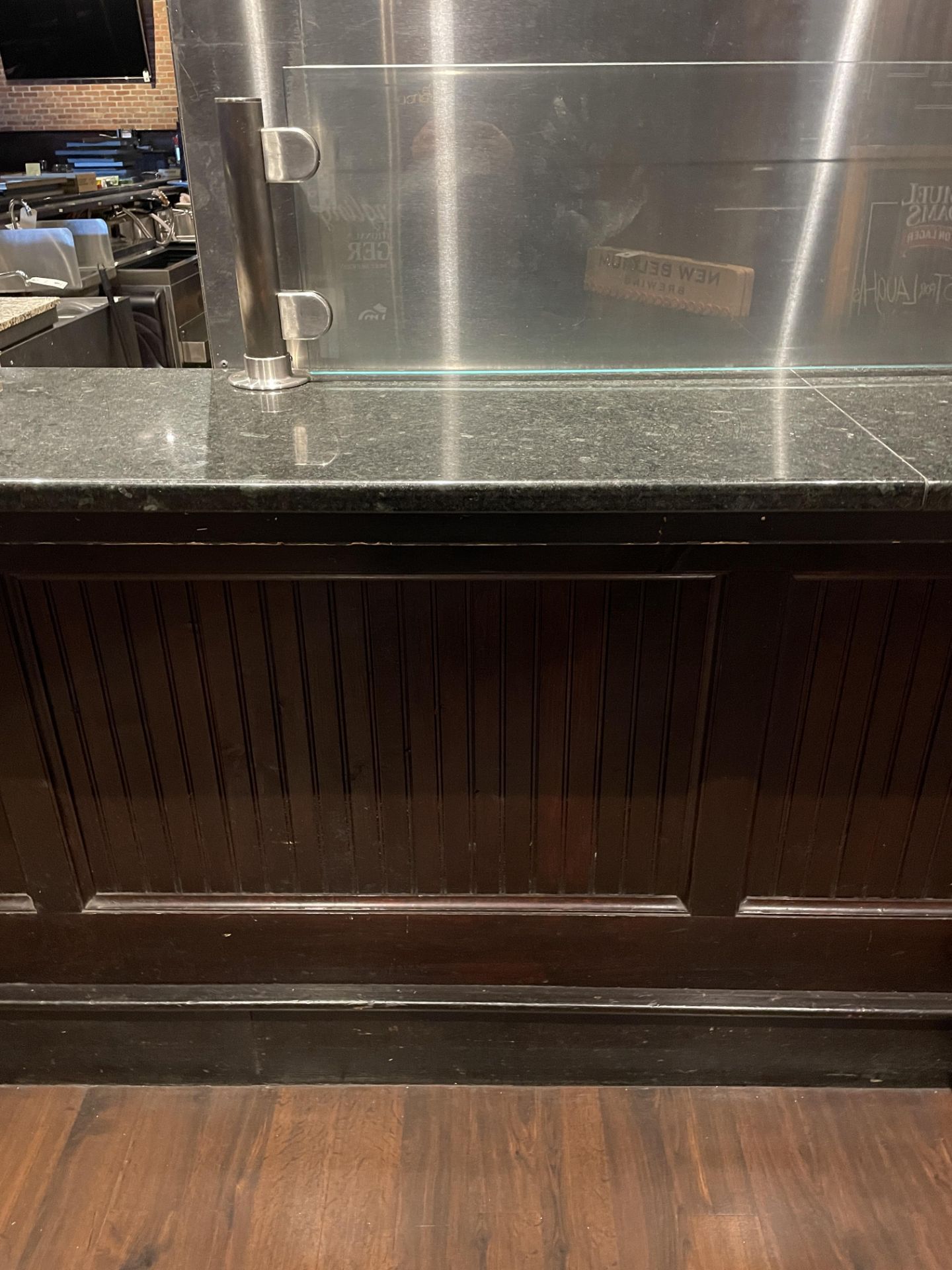 L Shaped Granite Top Wood Front Bar 21'+16'+8'x18" Depth w/ Wood Step Down and (3) wood Columns - Image 2 of 3