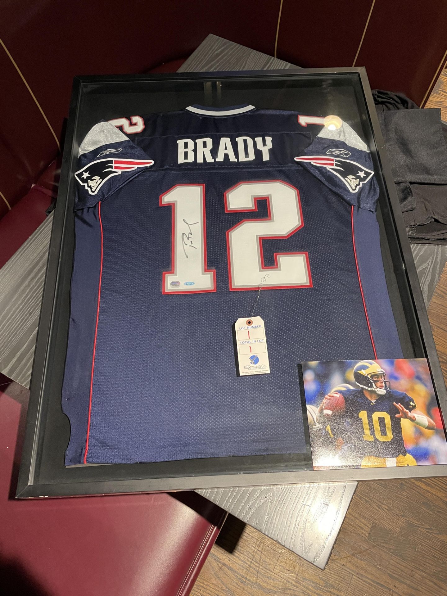 Tom Brady Autographed Patriots Jersey, Frame Mounted Authentication #0100105 From Mounted Memory.