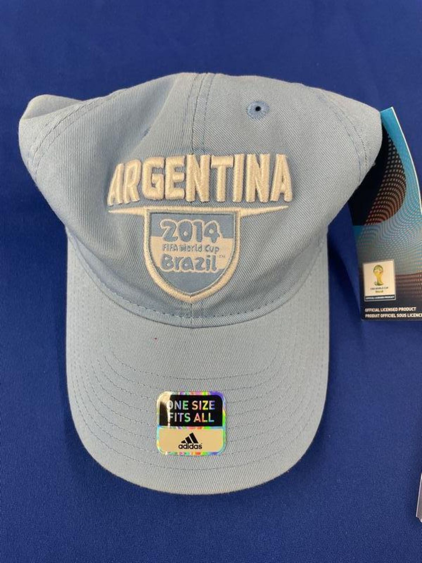 (LOT) 2014 FIFA Argentina Hat (NIB) and Messi Topps Player Card PSA Graded Mint 9 (April 2011) - Image 3 of 3