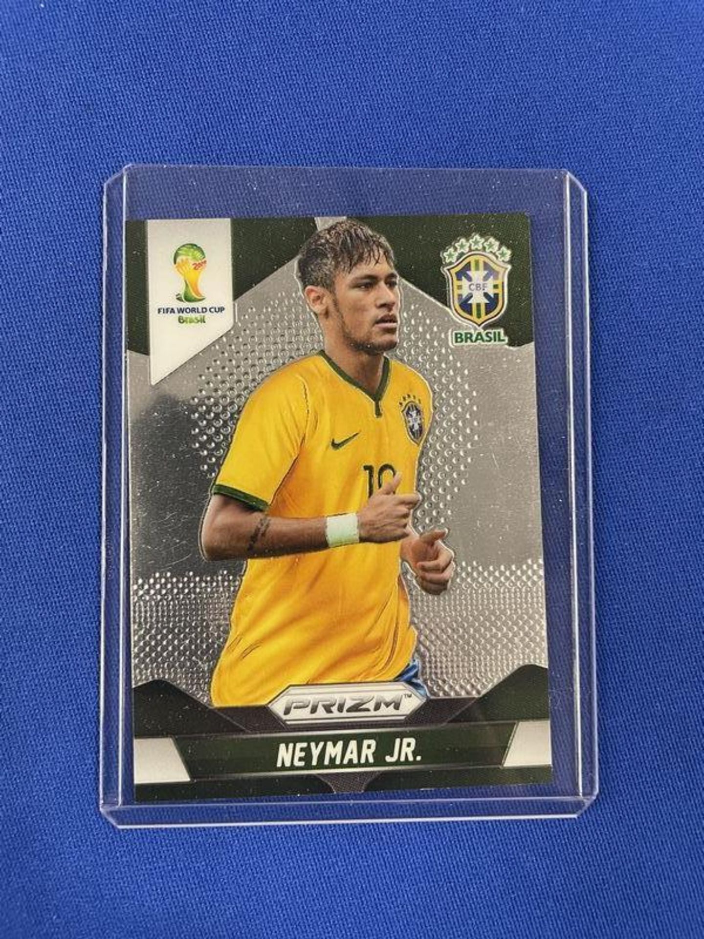 (LOT) 2014 FIFA Brazil Hat (NIB), Neymar Junior Panini Prism #112 Player Car, And Newspaper