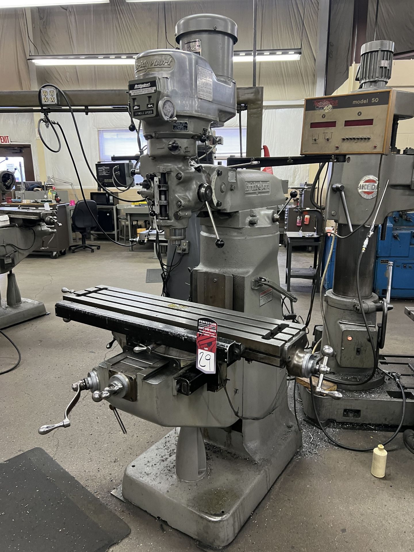BRIDGEPORT Vertical Milling Machine, s/n 210898, 9" x 42" Table, Trionics 50 2-Axis DRO (This lot is