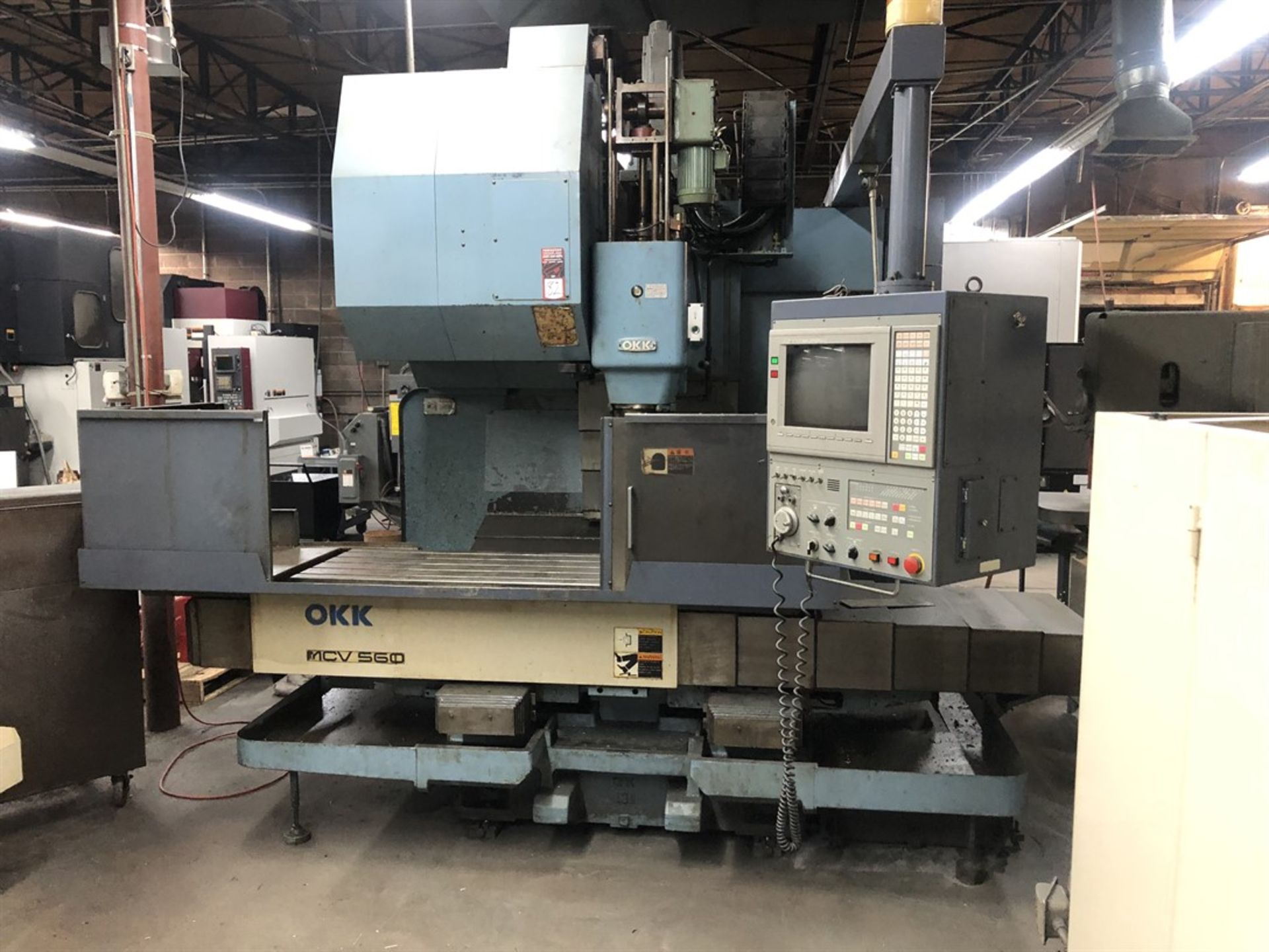 OKK MCV-560 Vertical Machining Center, s/n 186, Neomatic Control, 22” x 51” Table, CT50 Spindle