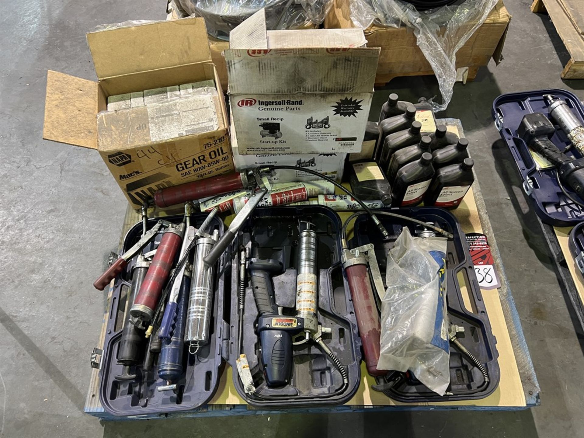 Pallet Comprising LINCOLN Air Grease Guns and Grease (Building 44)