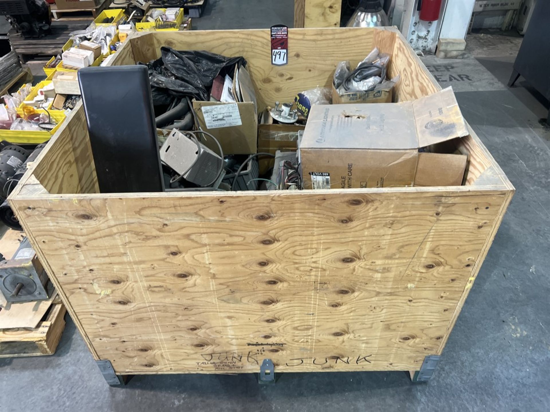 Crate of TAYLOR DUNN Parts Including Seats, Brake Parts, Wheel Hubs, Modules, and On Board Battery