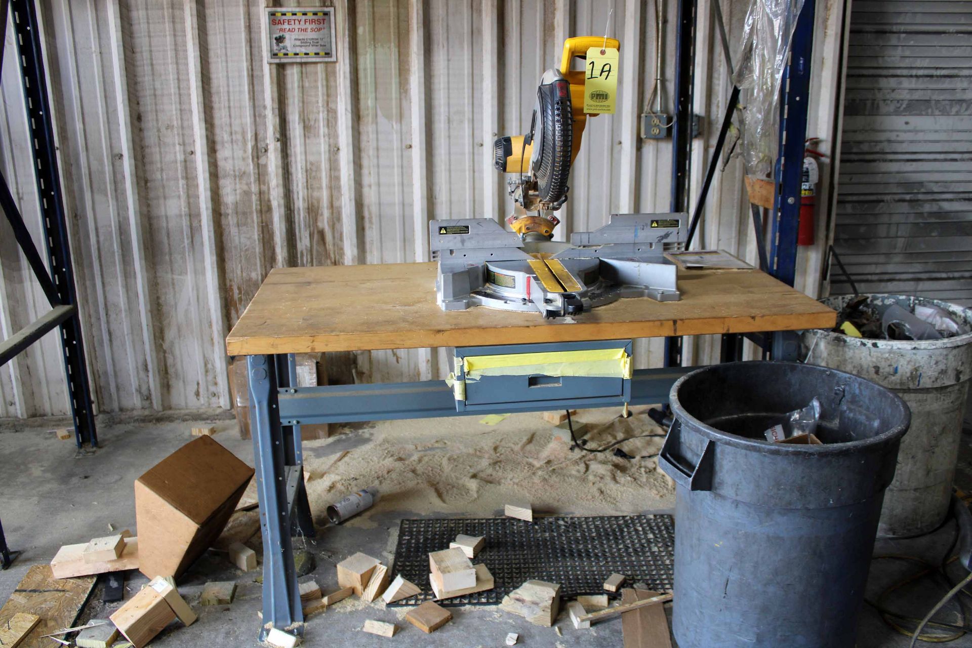 LOT CONSISTING OF: Dewalt miter saw, 12" dia., w/ table & Nilfisk Alto shop vac. (Located at: Emco