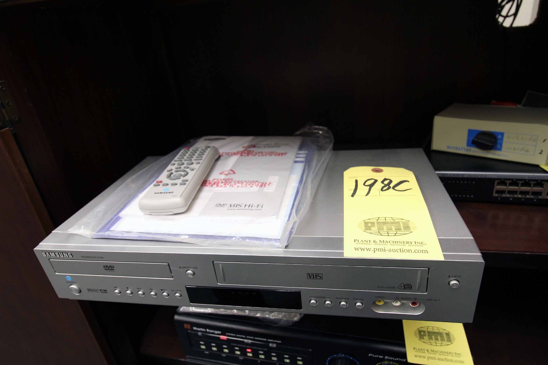 DVD/ VHS COMBO PLAYER, SANSUNG (Located at: Emco Wheaton USA, Inc., 9111 Jackrabbit road, Houston,