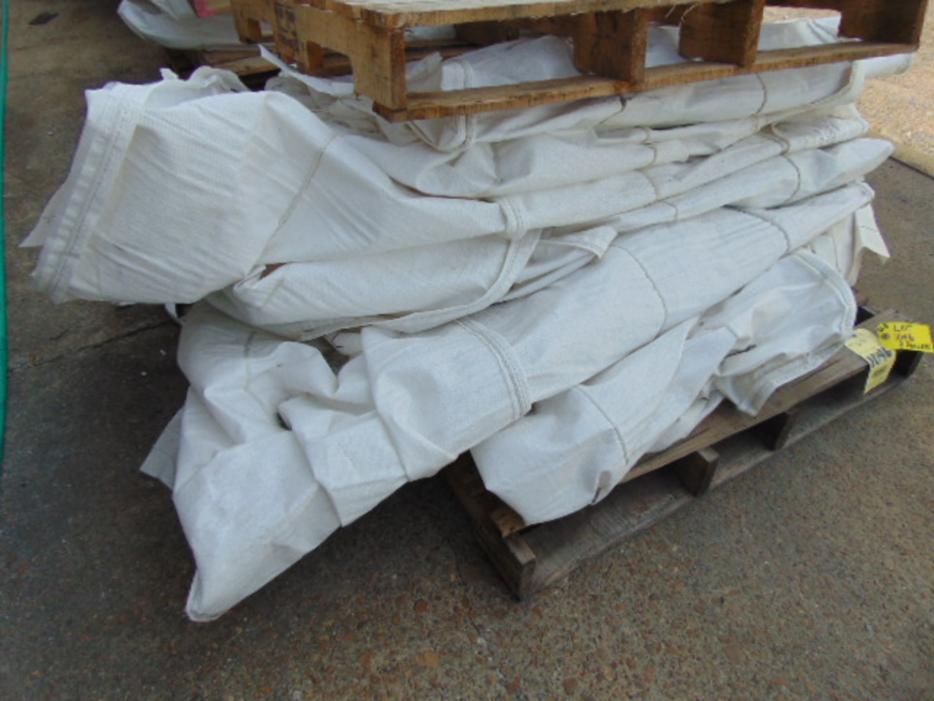 LOT OF RESIN NYLON BAGS, 4' X 4' X 4' (on three pallets) (Machine shop area, dock)