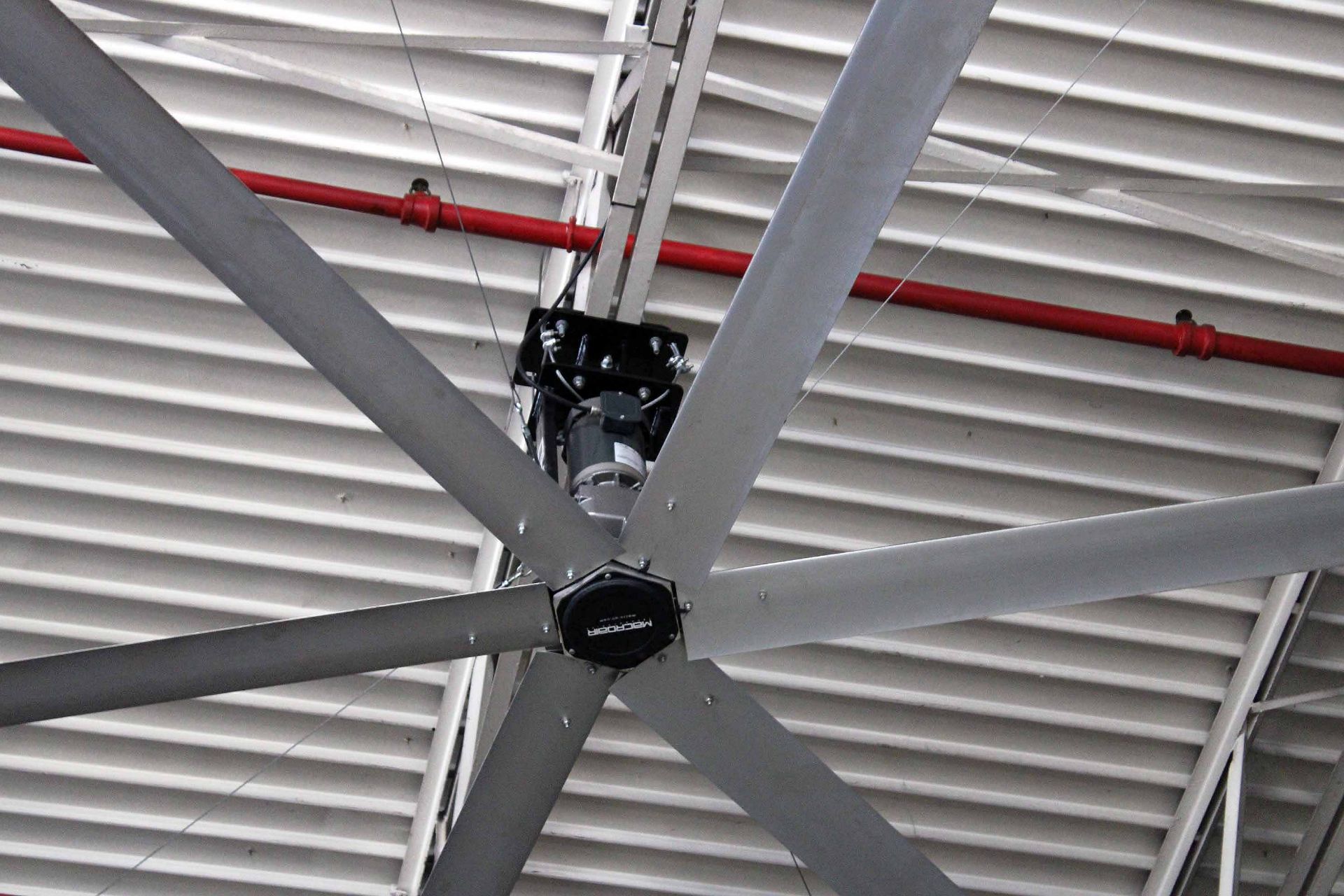FAN, MACRO AIR TECHNOLOGIES, approx. 20' fan, approx. 23' off ground, (Mounted to roof, will need to - Image 2 of 3
