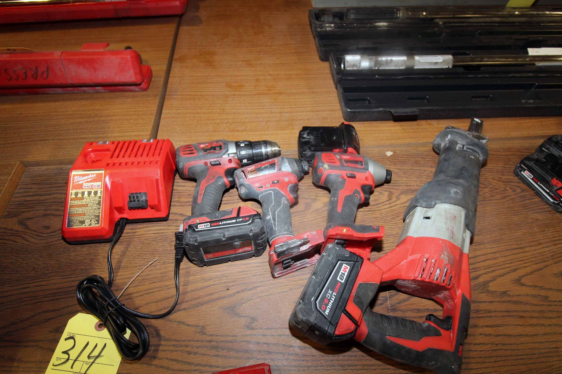 LOT OF MILWAUKEE CORDLESS TOOLING: (2) impacts, (1) right angle drill, (1) reciprocating saw, (3)