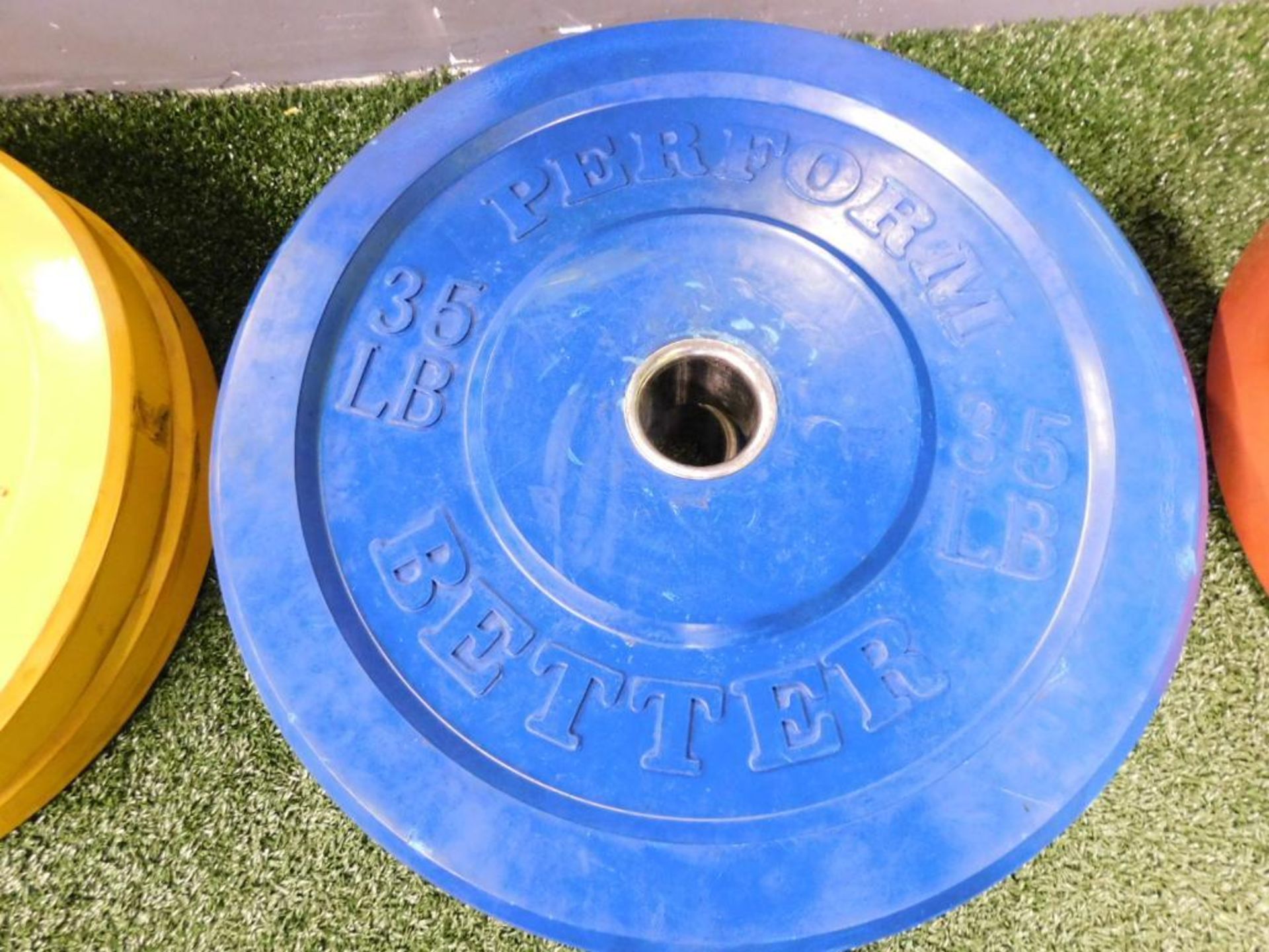 LOT: (2) Perform Better Rubber Coated 35 lb. Plates