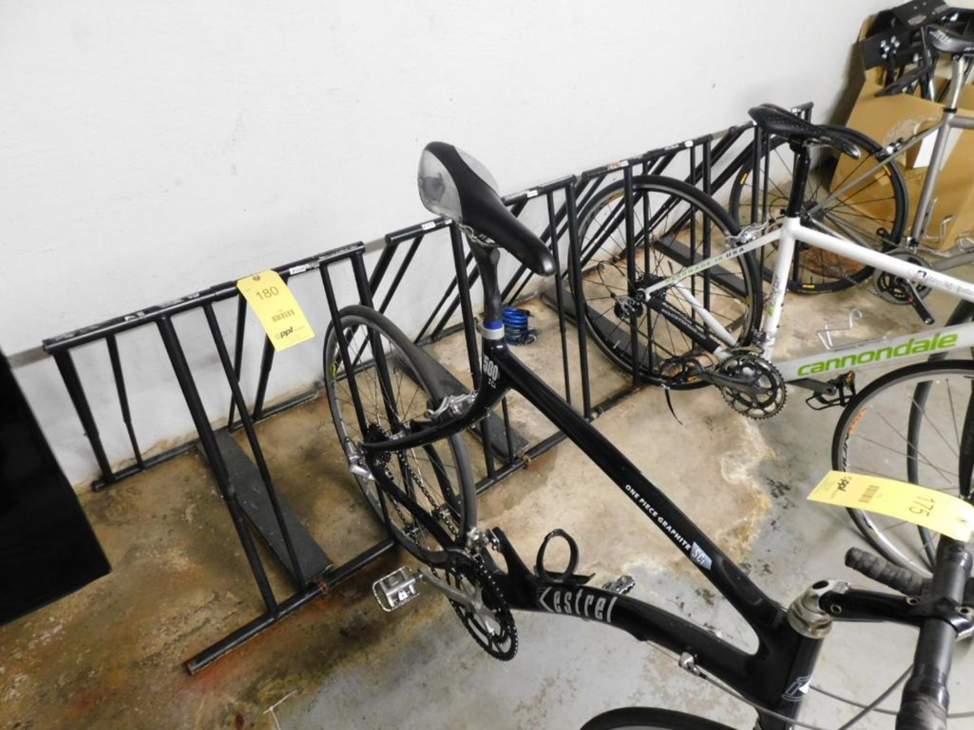 LOT: (7) 2-Bike Racks w/Mounted Bike Hangers in Basement (approx. 25)