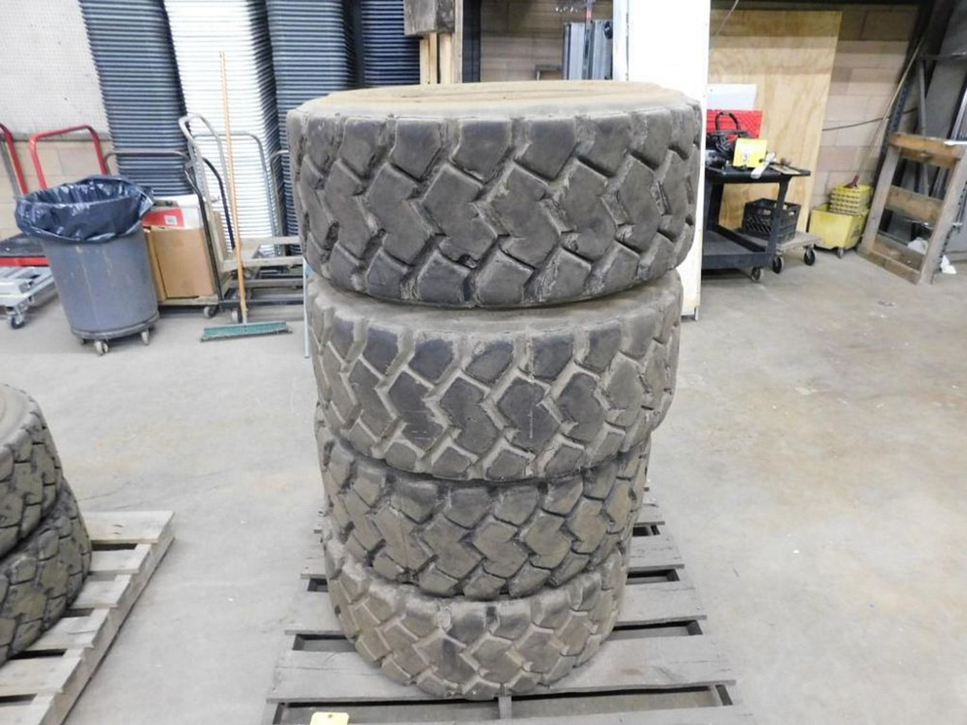 LOT: (4) Bobcat Heavy Duty 12-16.5" NHS Tires, Bead Guard, Tubeless (LOCATION: 318 N. Milwaukee