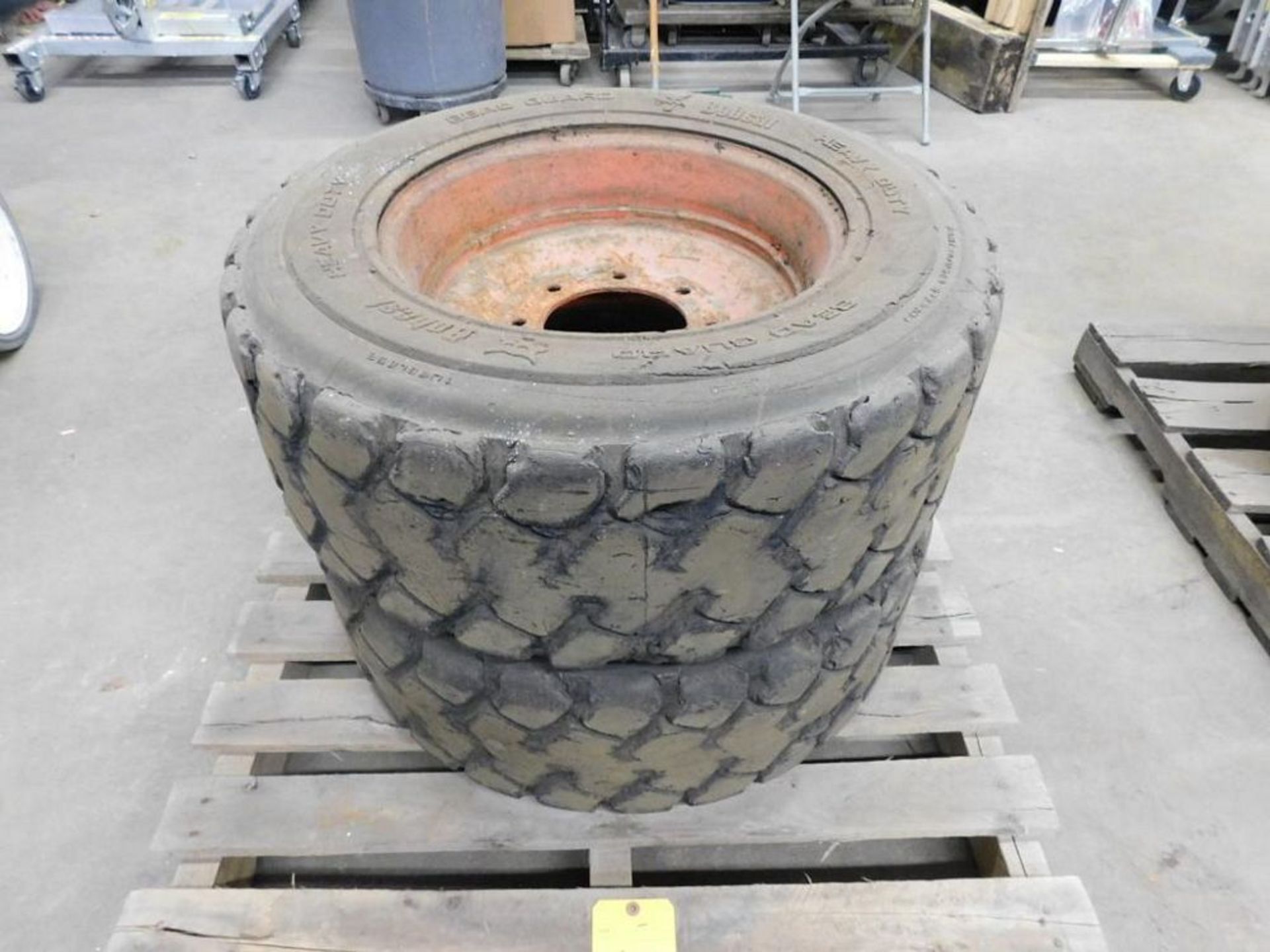 LOT: (2) Bobcat Heavy Duty 10-16.5" NHS Tires, Bead Guard, Tubeless (LOCATION: 318 N. Milwaukee