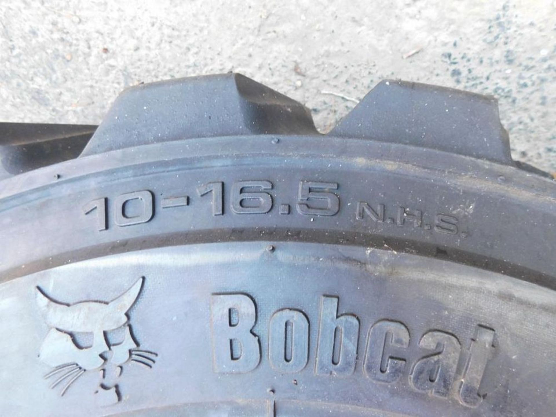 LOT: (2) Bobcat Heavy Duty 10-16.5 NHS Super Grip Tires, Tubeless, Bead Guard, 10 Ply Rating ( - Image 4 of 7