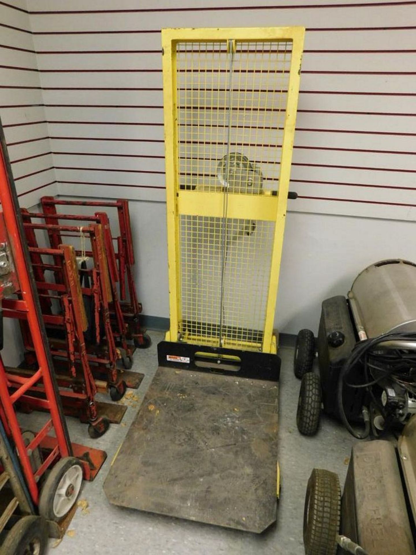 53" Manual Stacker Lift, 28" x 24" Platform (LOCATION: 318 N. Milwaukee Ave., Wheeling, IL 60090)