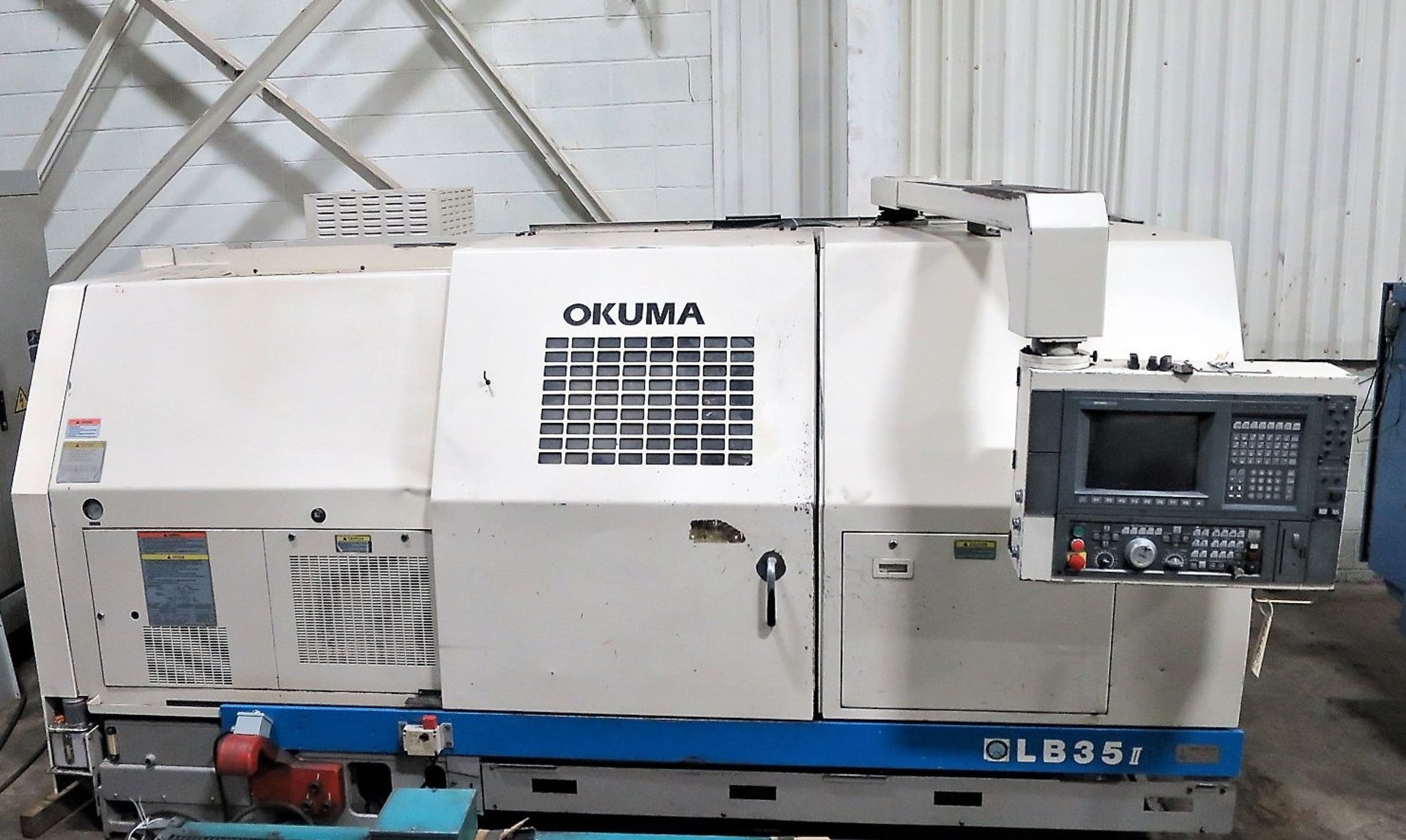 OKUMA LB35II CNC 2-AXIS TURNING CENTER LATHE, S/N 0589, NEW 1998