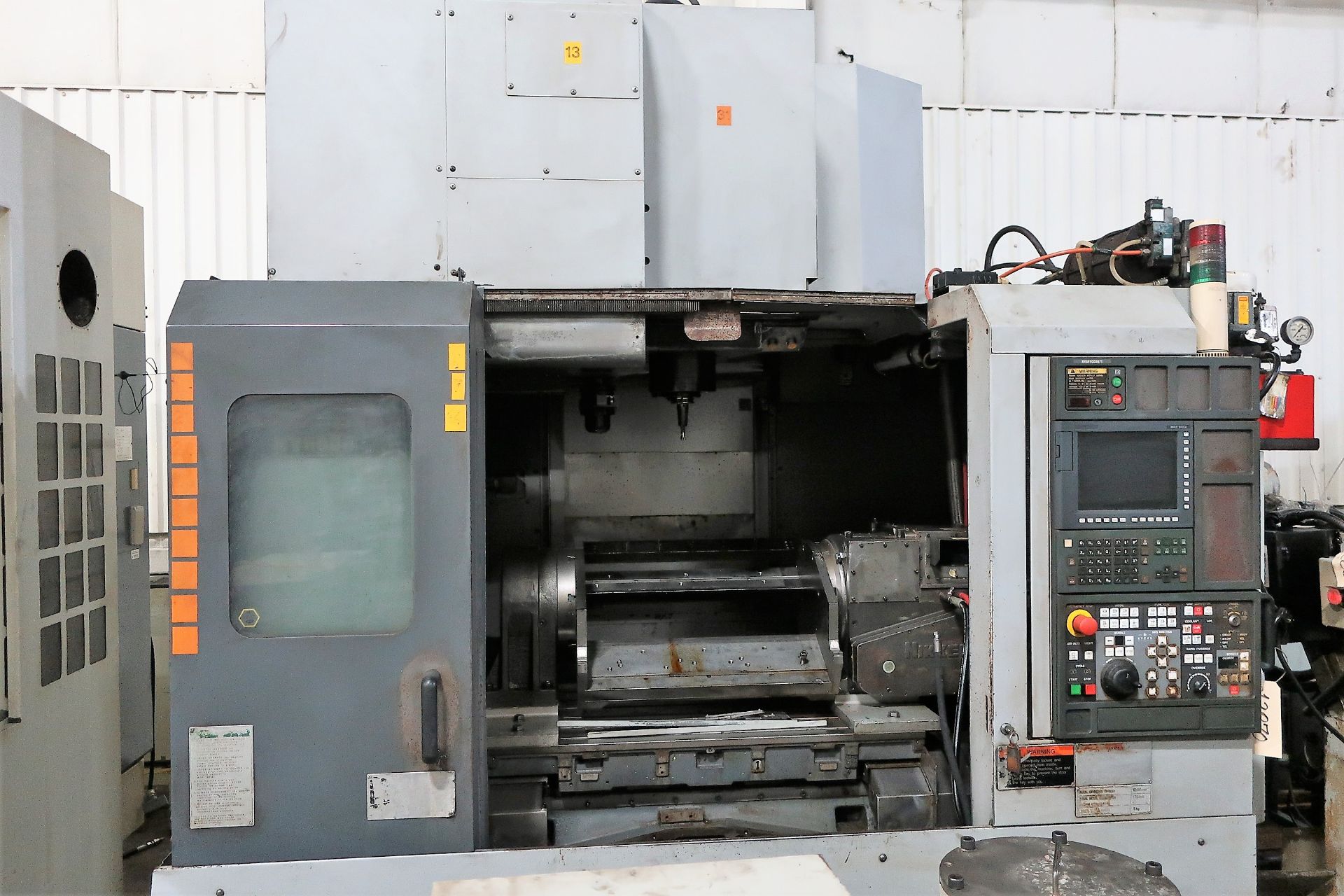 MORI SEIKI NV5000A/40 4-AXIS CNC VERTICAL MACHINING CENTER, NEW 2003