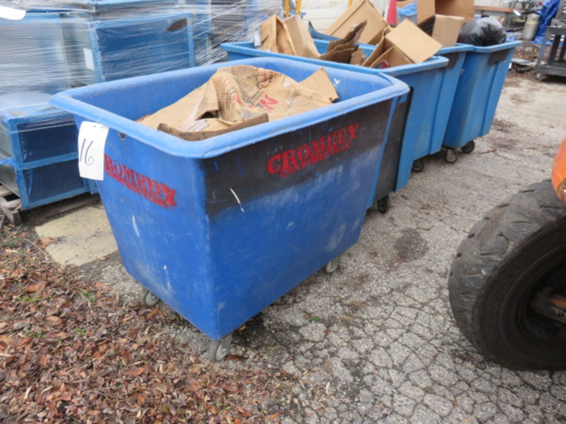 (7) BLUE BUSHEL CARTS (SOME GOUGED) - NO CONTENTS!