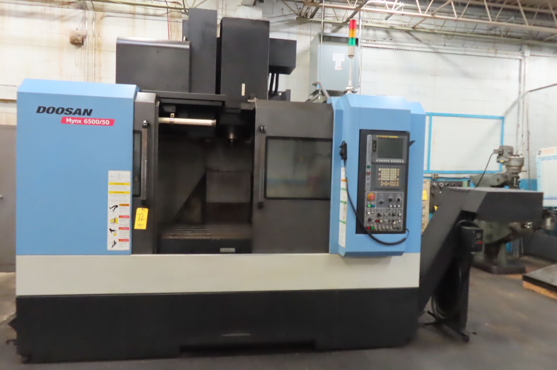 2012 DOOSAN MYNX6500/50 CNC VERTICAL MCHINING CENTER, S/N MVOO49-001087...